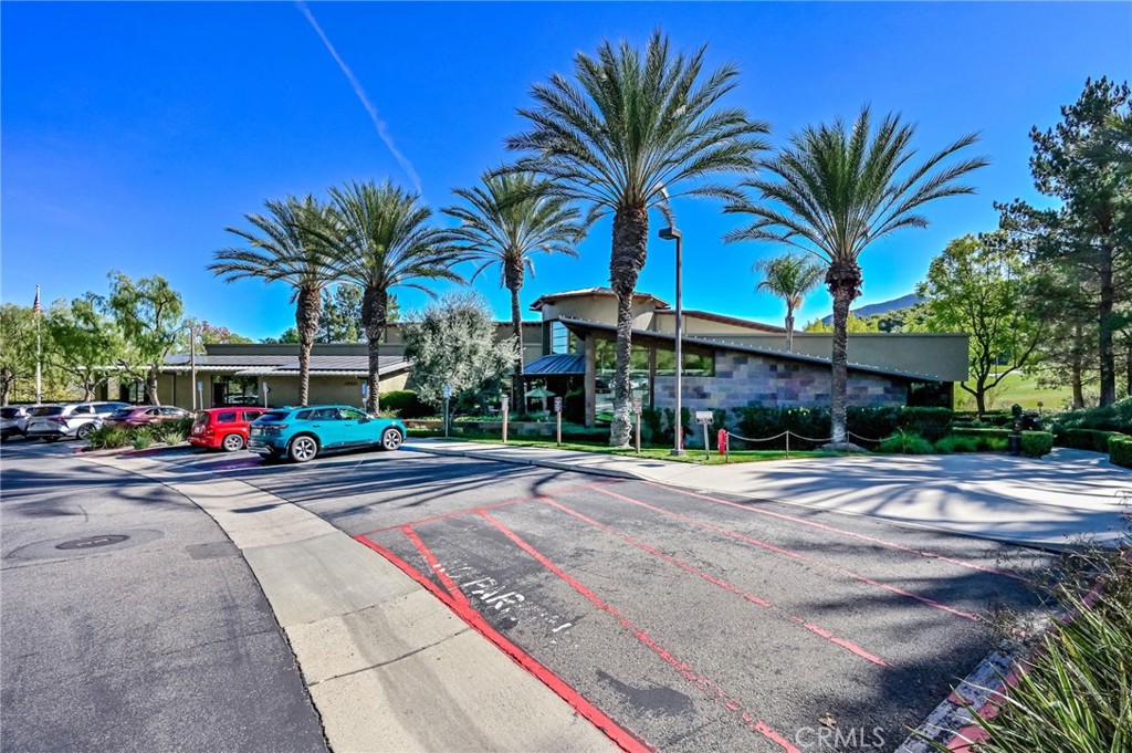 9141 Filaree Court Corona, CA 92883 - Photo 46 of 54 a street sign on a sidewalk next to a road