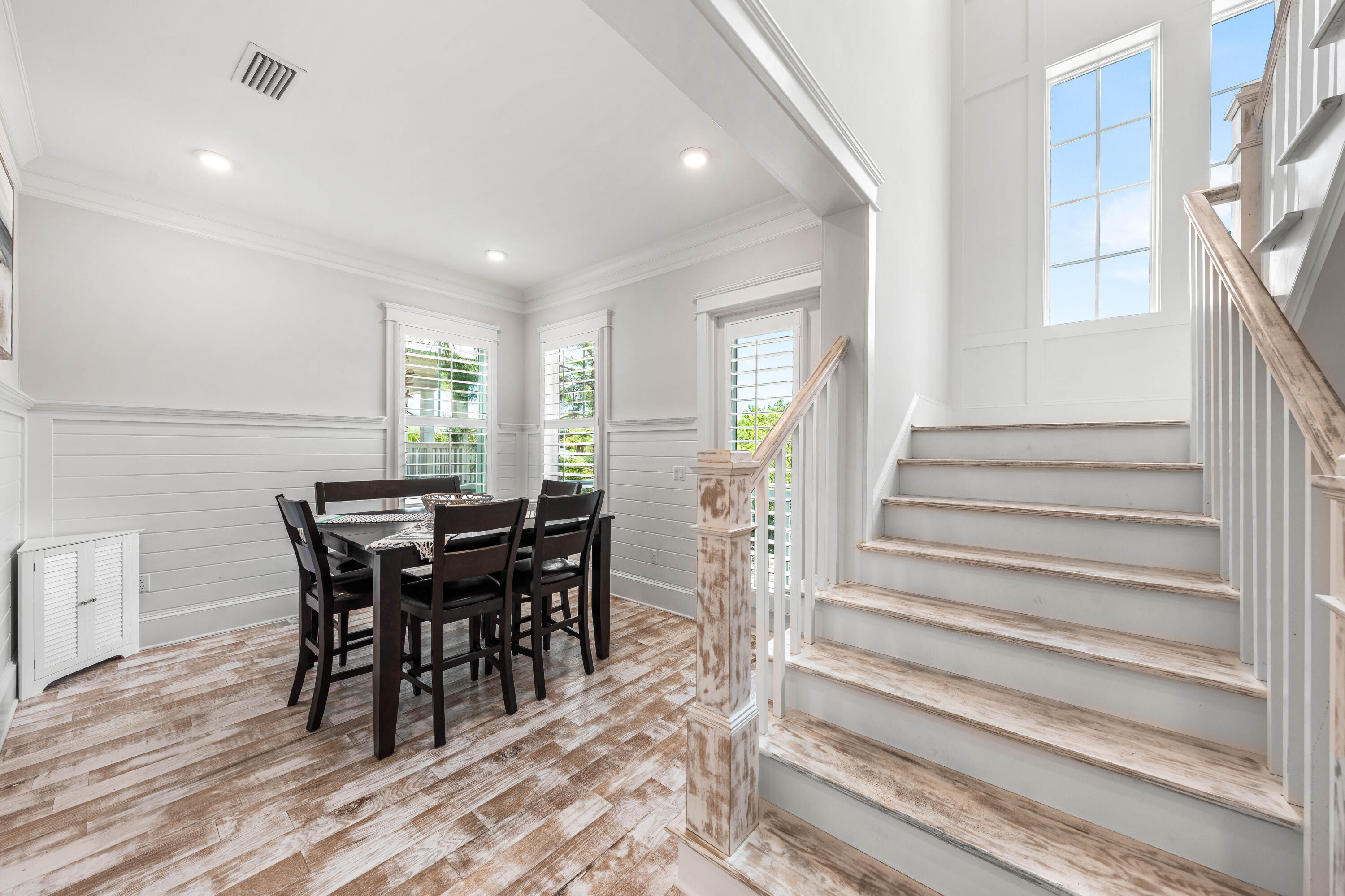 164 Clipper Street Inlet Beach, FL 32461 - Photo 20 of 75 a view of a dining room with furniture and wooden floor