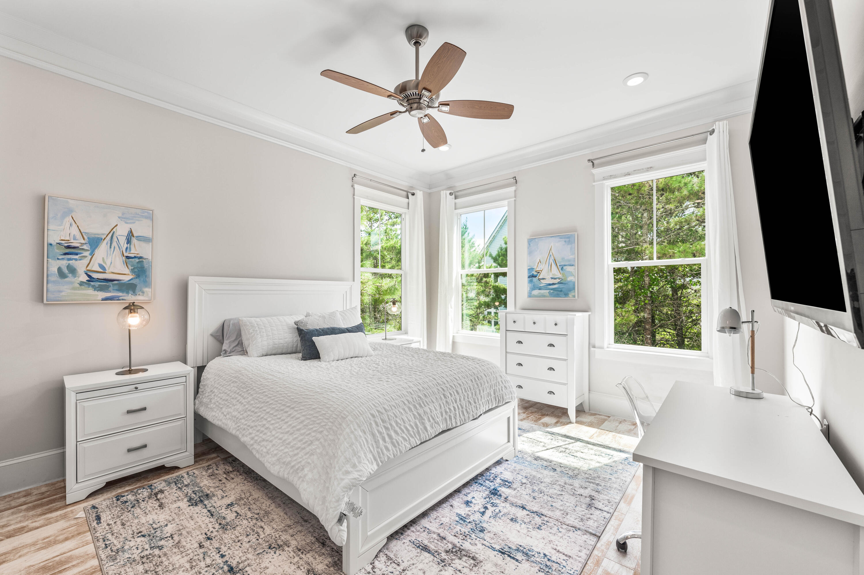 164 Clipper Street Inlet Beach, FL 32461 - Photo 26 of 75 a bedroom with a large bed and a large window