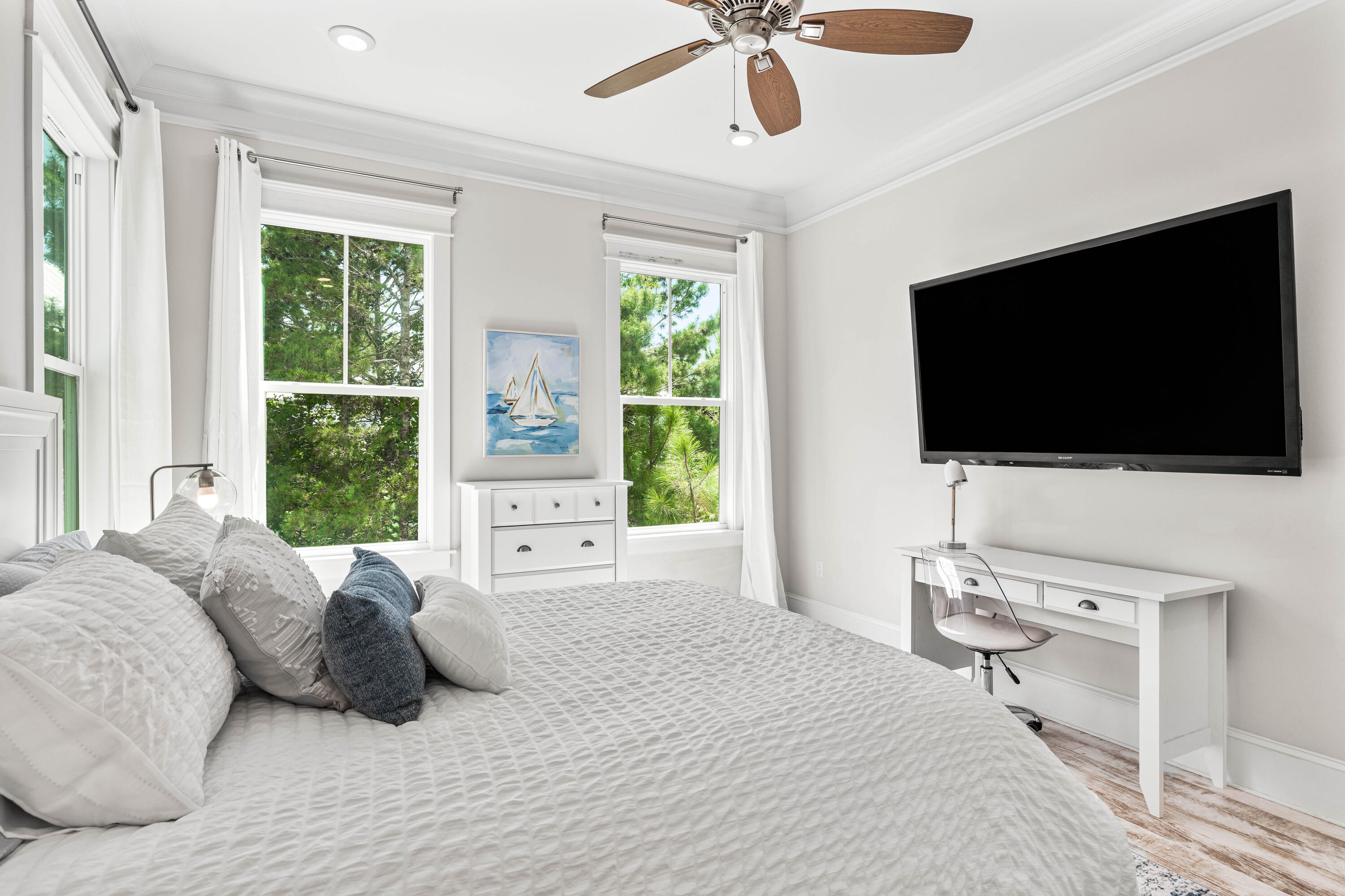 164 Clipper Street Inlet Beach, FL 32461 - Photo 27 of 75 a bedroom with a bed tv and window