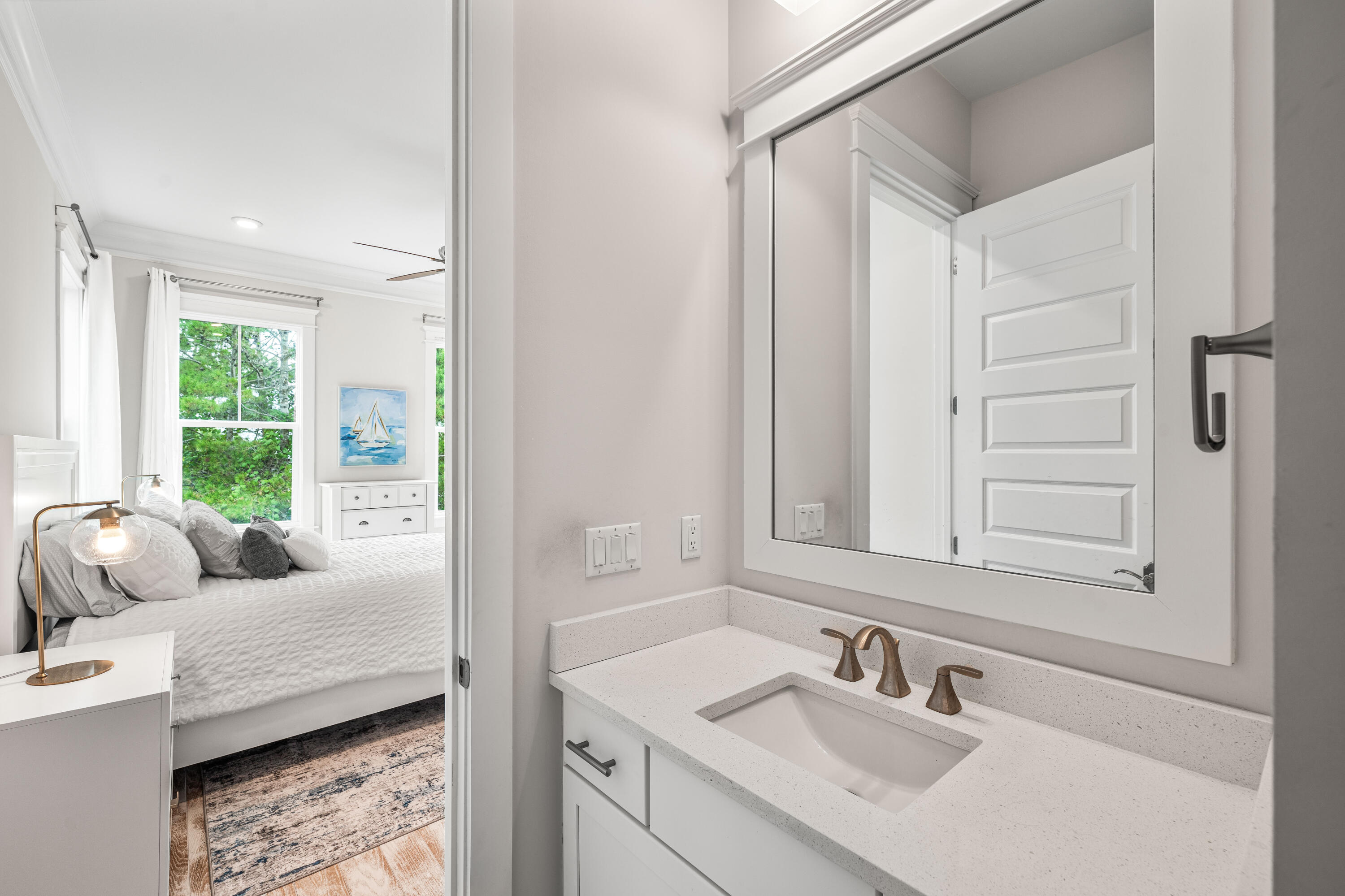 164 Clipper Street Inlet Beach, FL 32461 - Photo 29 of 75 a bathroom with a granite countertop sink and a mirror