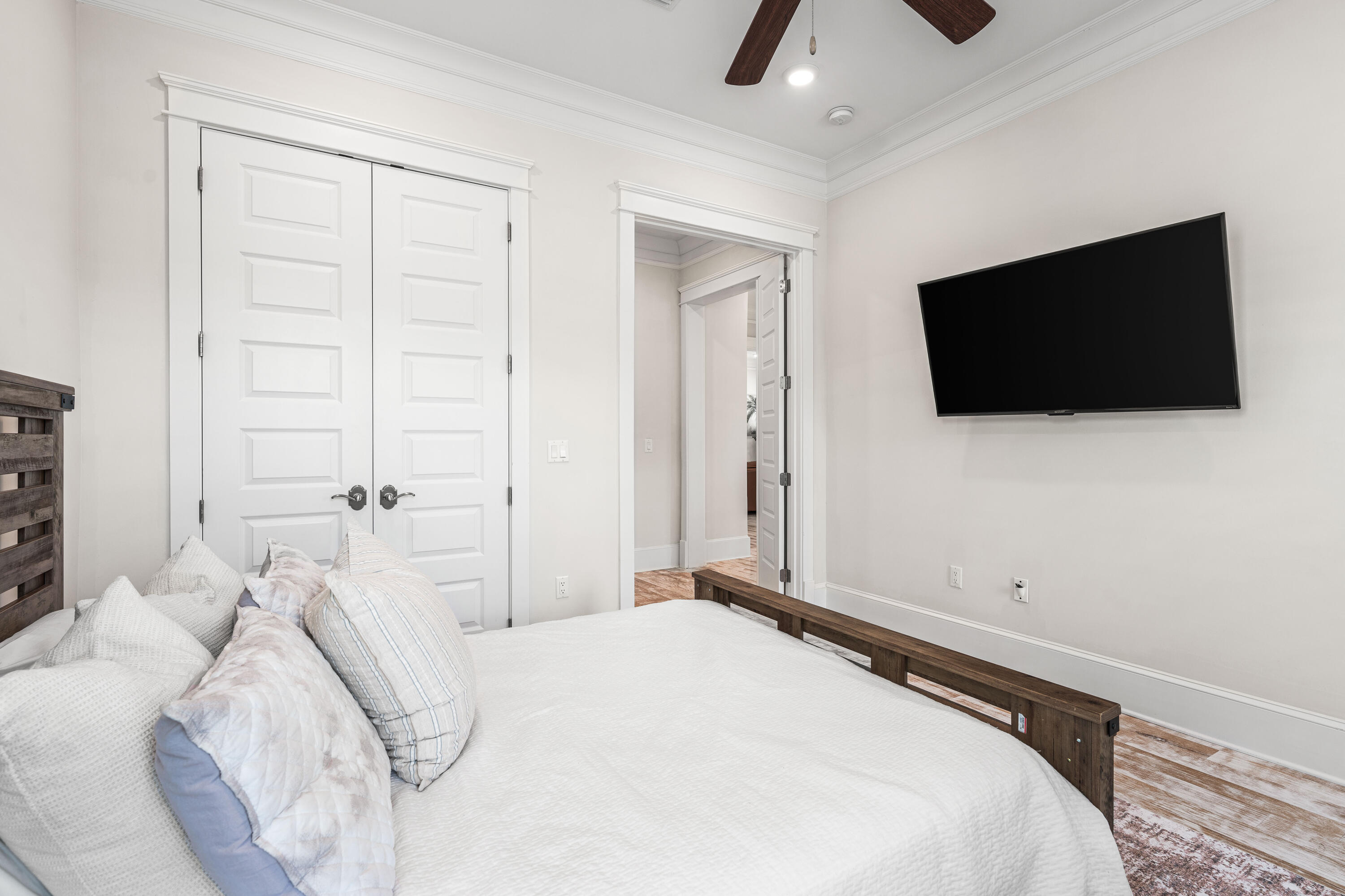 164 Clipper Street Inlet Beach, FL 32461 - Photo 32 of 75 a bedroom with a bed and a flat screen tv