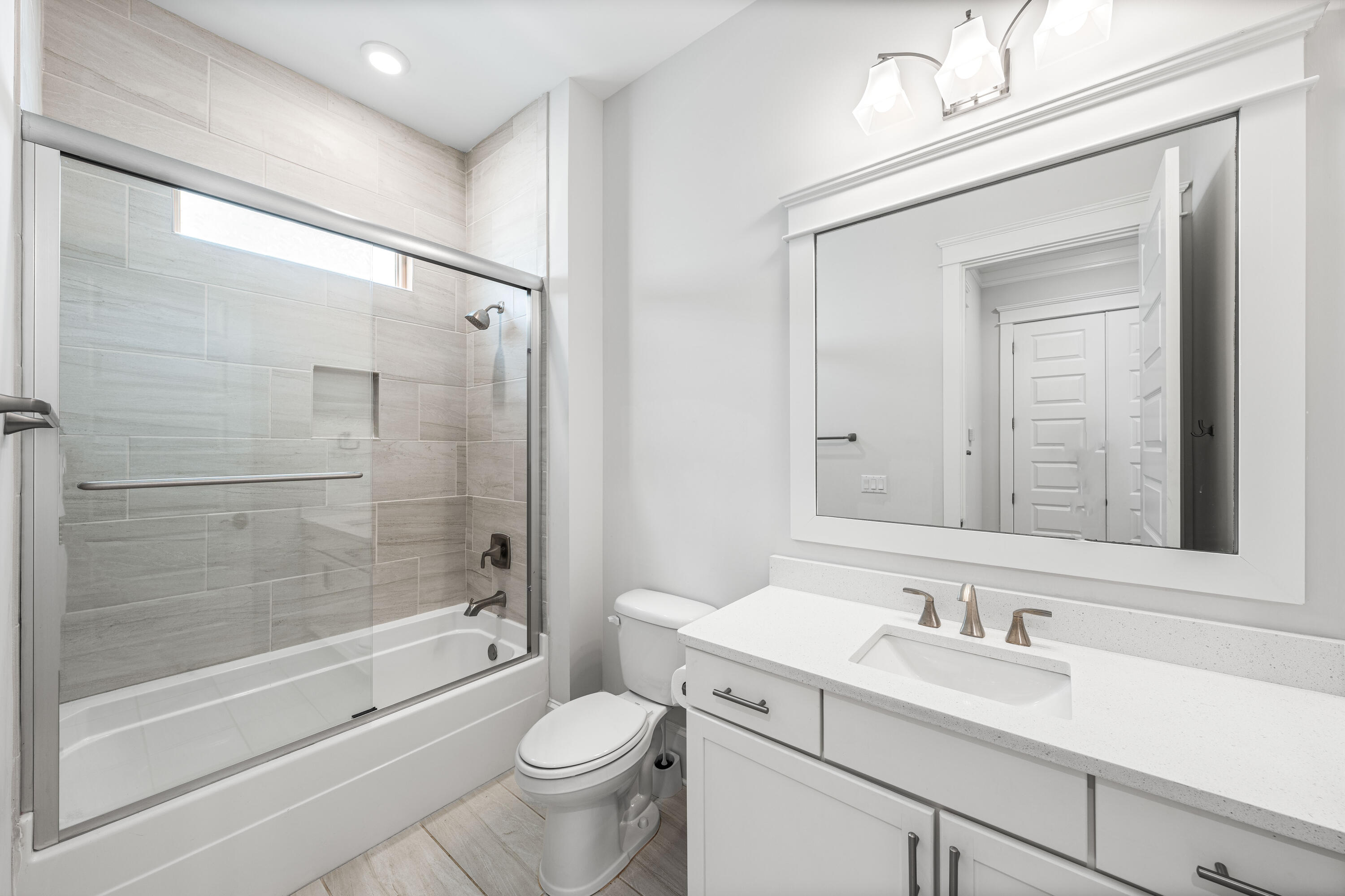 164 Clipper Street Inlet Beach, FL 32461 - Photo 35 of 75 a bathroom with a sink toilet a mirror and shower