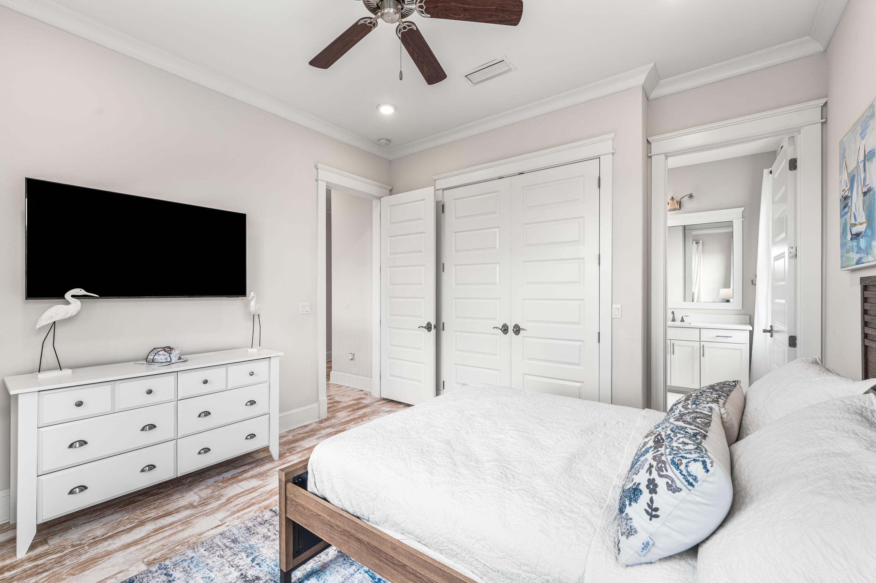 164 Clipper Street Inlet Beach, FL 32461 - Photo 40 of 75 a bedroom with a bed and a flat tv screen on dresser