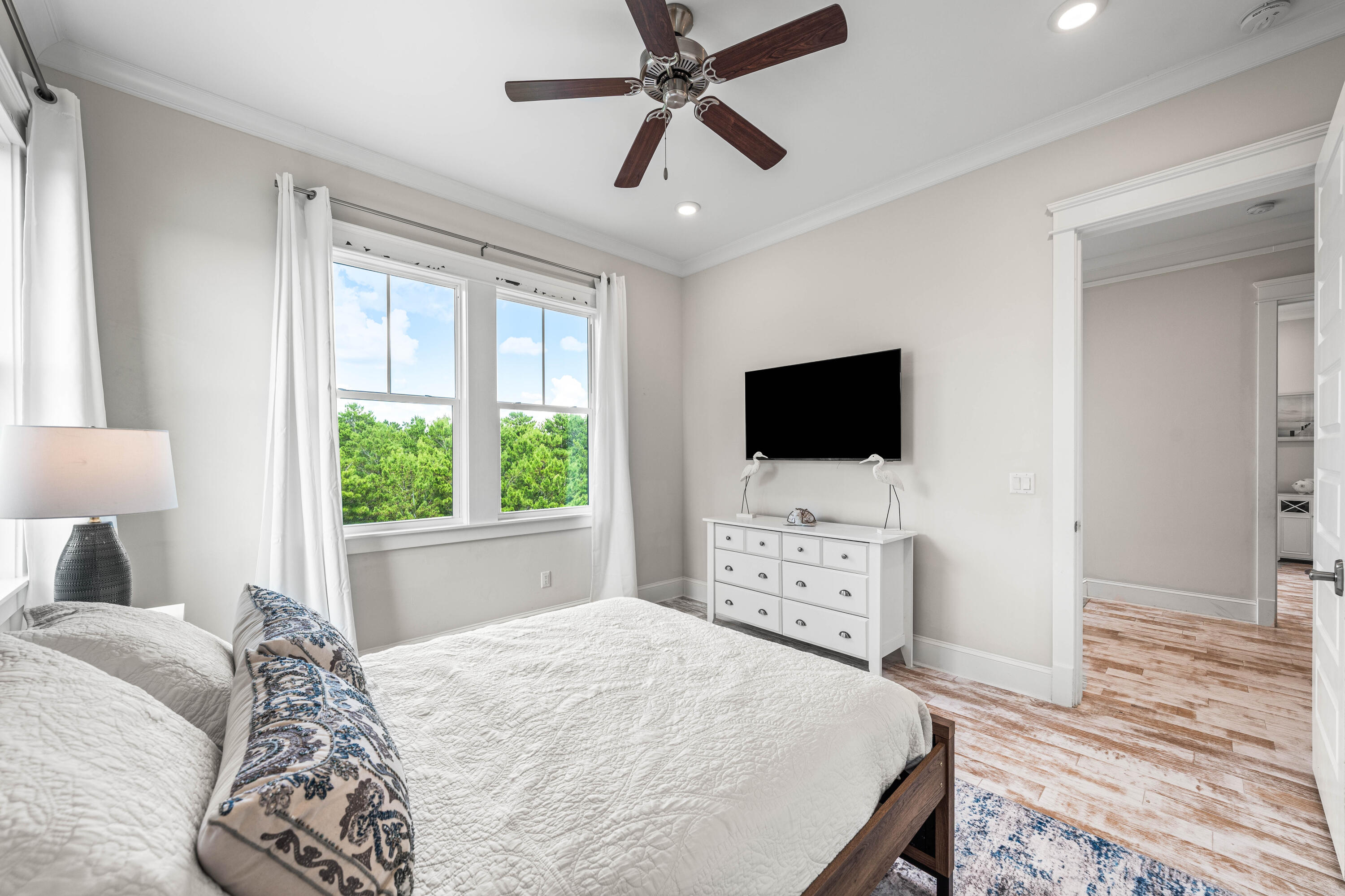 164 Clipper Street Inlet Beach, FL 32461 - Photo 42 of 75 a bedroom with a bed and a flat screen tv