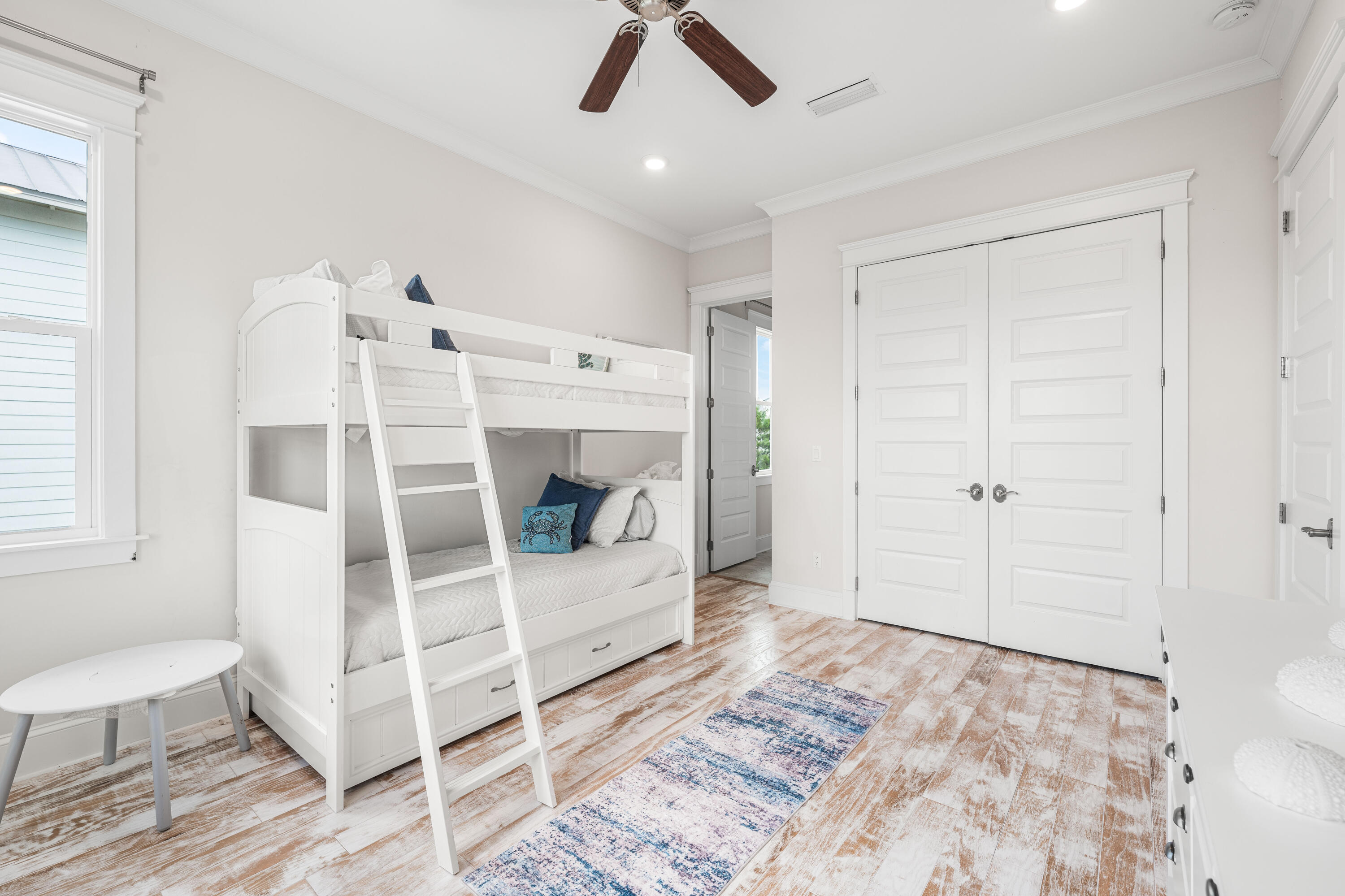 164 Clipper Street Inlet Beach, FL 32461 - Photo 45 of 75 a bedroom with a bed and a window