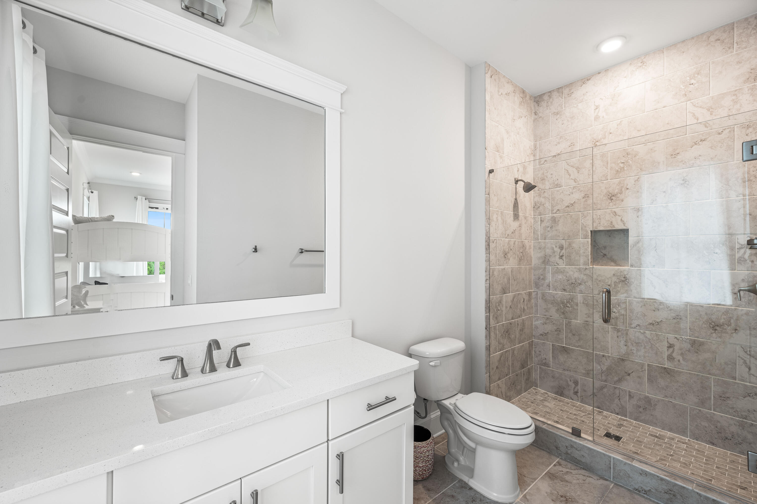 164 Clipper Street Inlet Beach, FL 32461 - Photo 46 of 75 a bathroom with a sink a toilet and shower