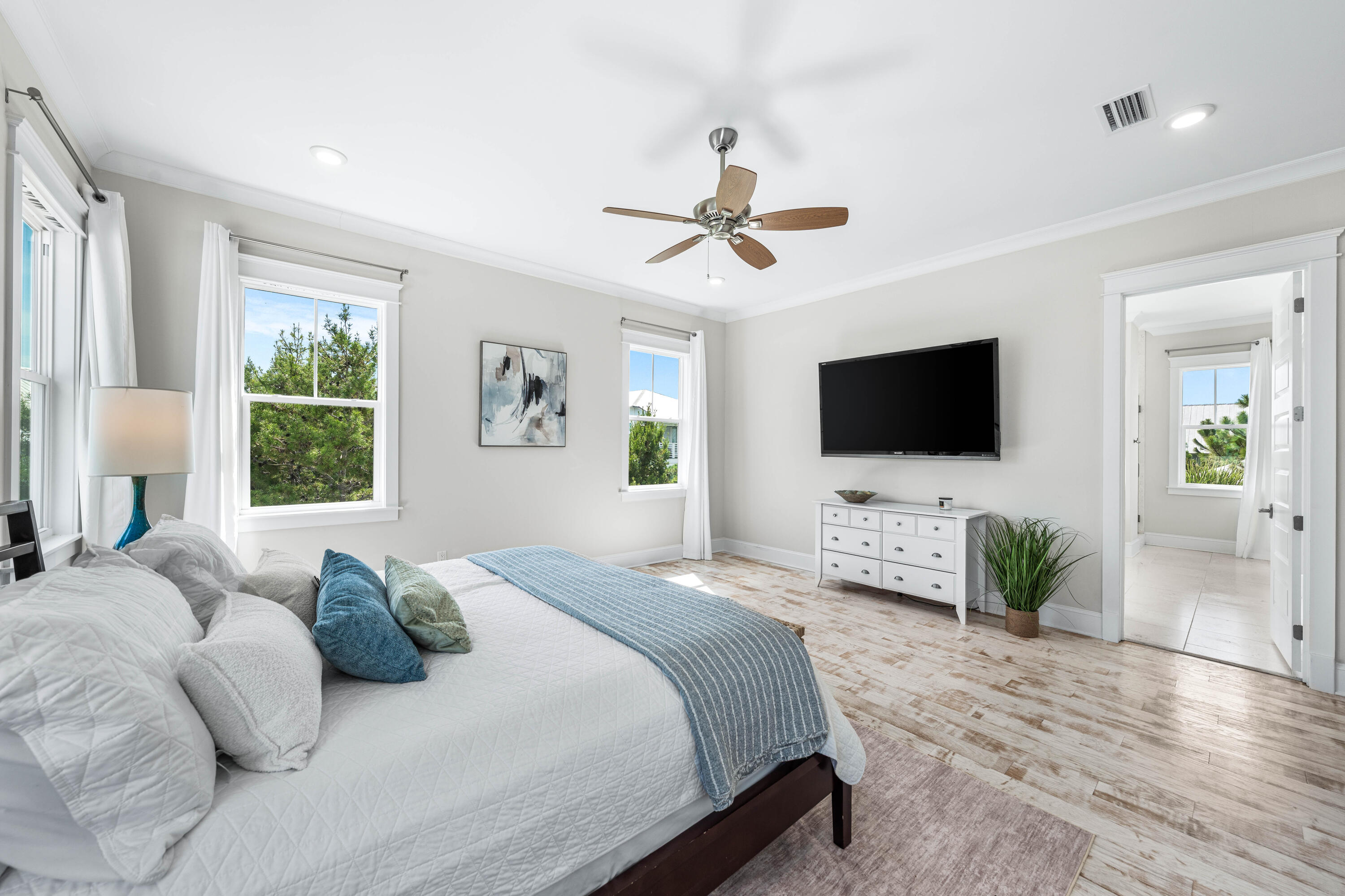 164 Clipper Street Inlet Beach, FL 32461 - Photo 50 of 75 a bedroom with a bed television window and flat screen tv