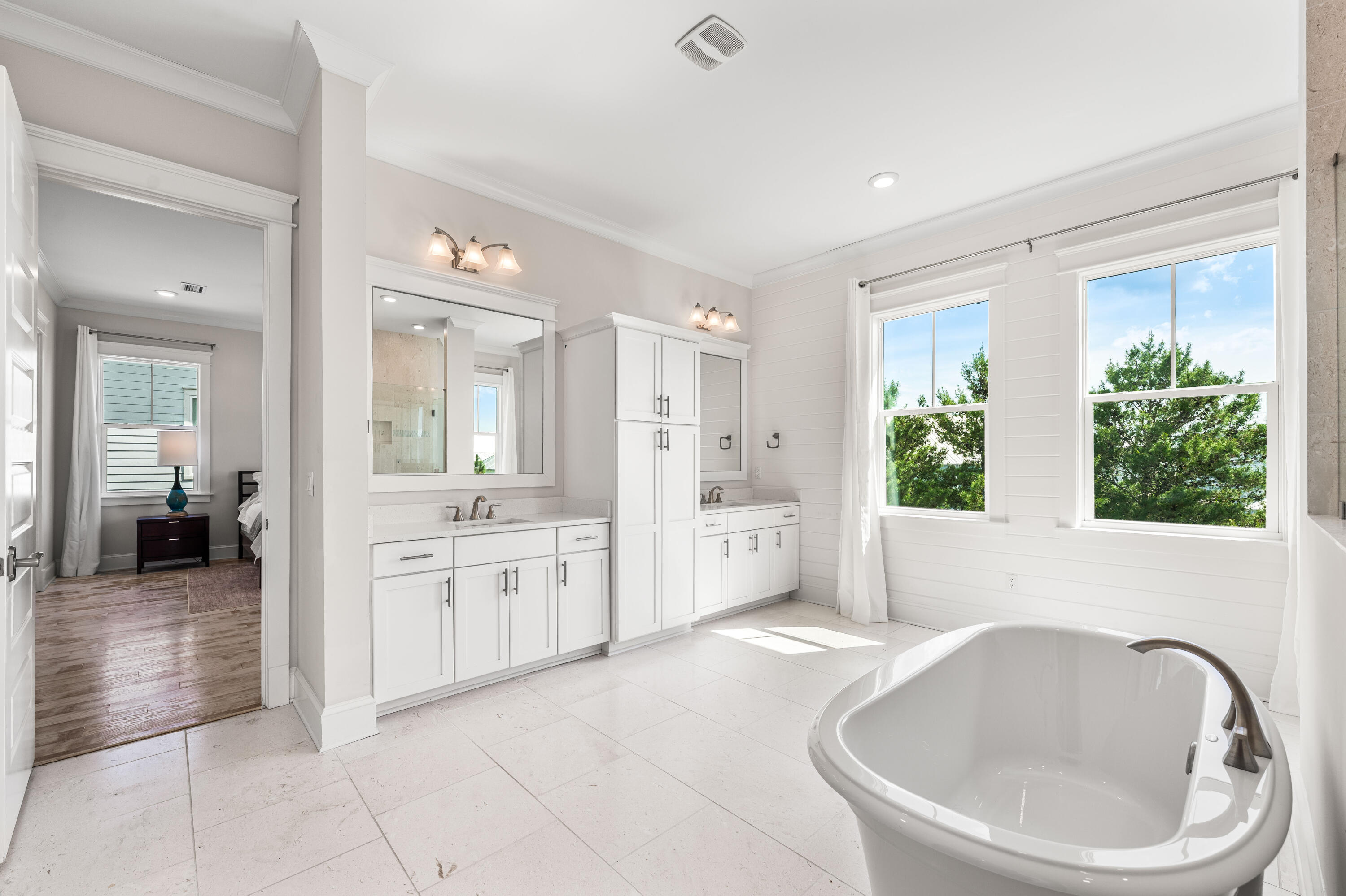 164 Clipper Street Inlet Beach, FL 32461 - Photo 51 of 75 a spacious bathroom with a granite countertop tub shower and mirror