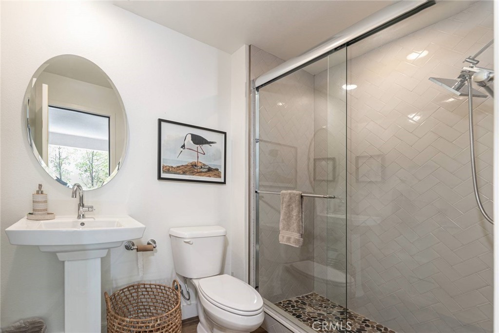 2148 Doheny Way Dana Point, CA 92629 - Photo 2 of 31 a bathroom with a toilet a sink and shower