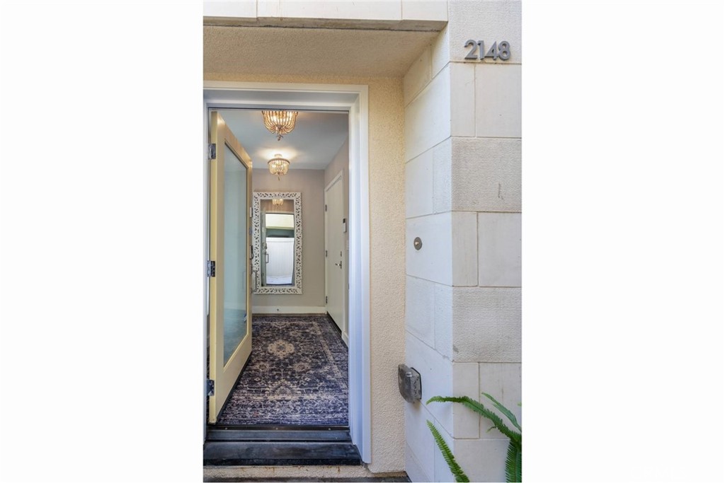 2148 Doheny Way Dana Point, CA 92629 - Photo 28 of 31 a bathroom with a sink and a mirror