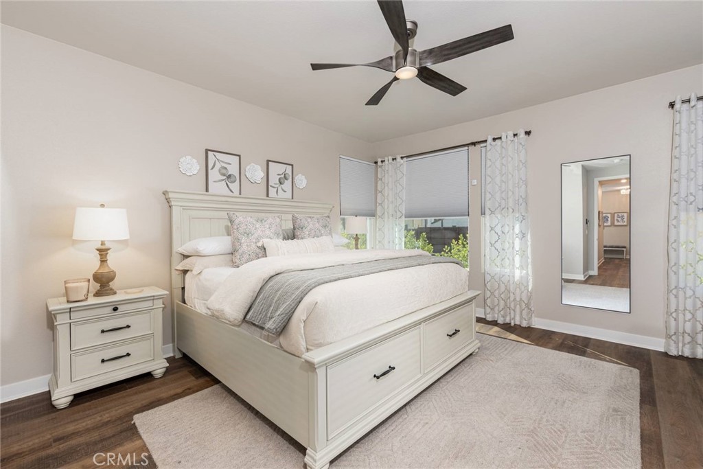 2148 Doheny Way Dana Point, CA 92629 - Photo 5 of 31 a bedroom with a bed and a lamp on the dresser