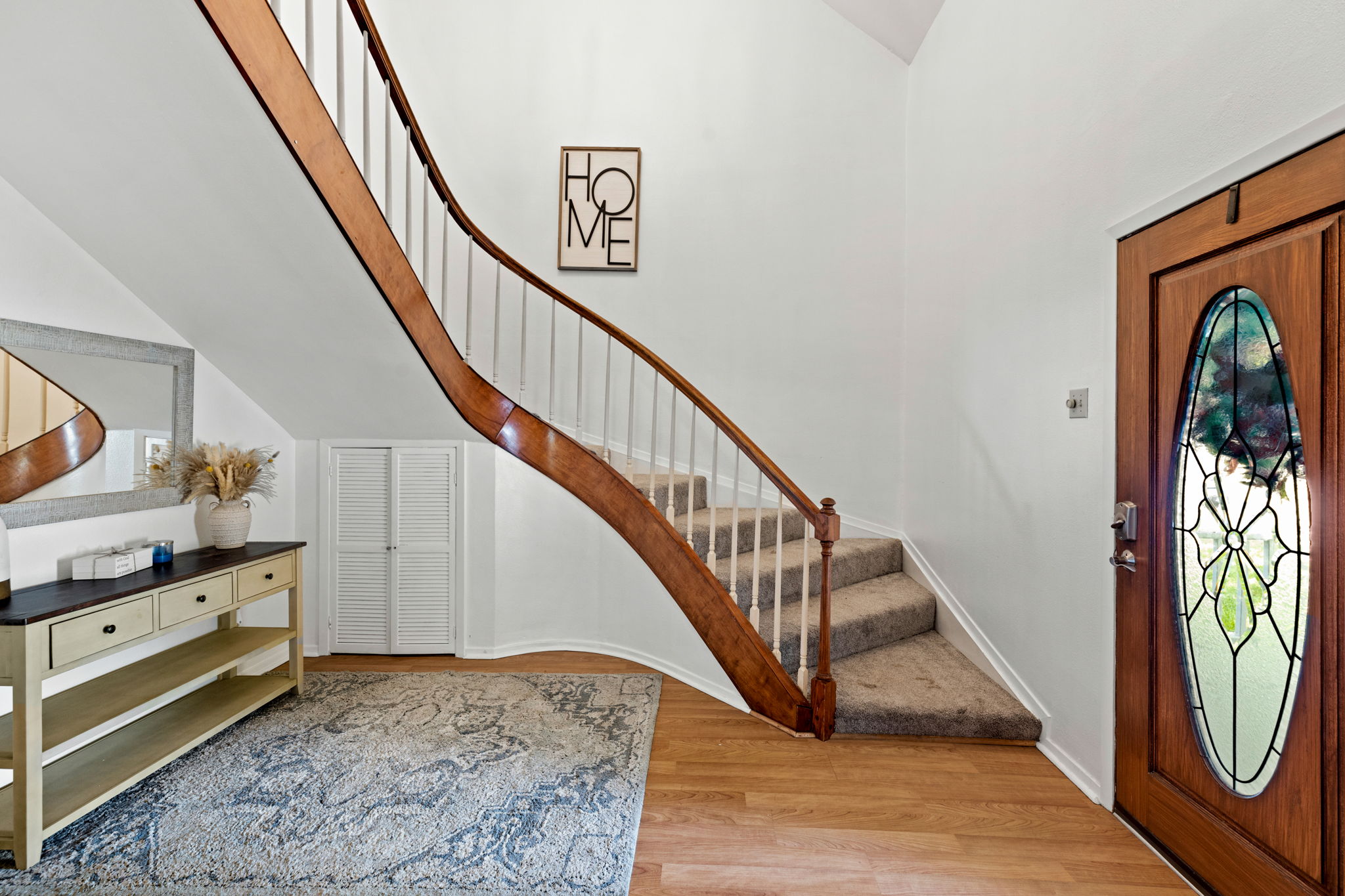 116 South Hackberry Avenue Luling, TX 78648 - Photo 8 of 39 a view of entryway and hall with wooden floor