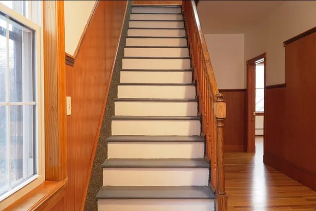 a view of entryway with wooden floor
