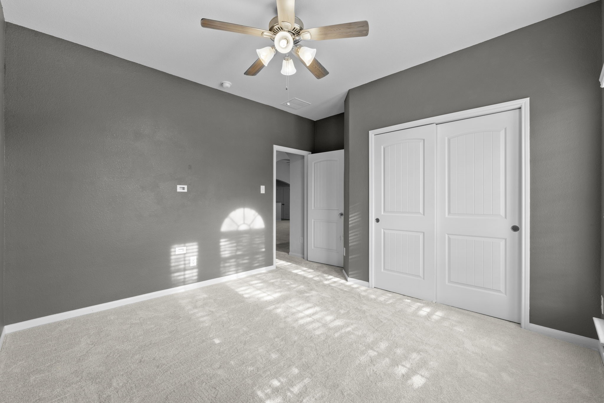 4706 Alluvial Circle Alvin, TX 77511 - Photo 12 of 39 a view of a livingroom with a chandelier fan