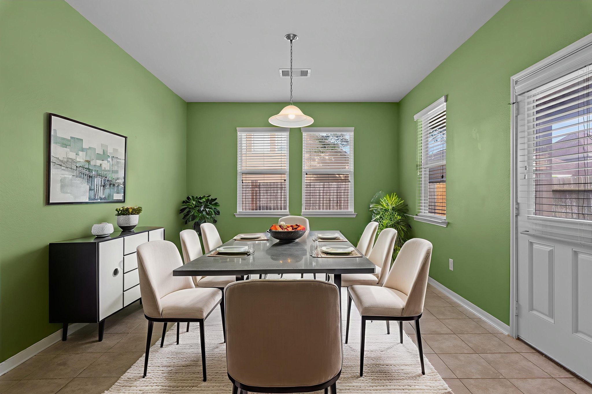 4706 Alluvial Circle Alvin, TX 77511 - Photo 18 of 39 a dining room with furniture a chandelier and window