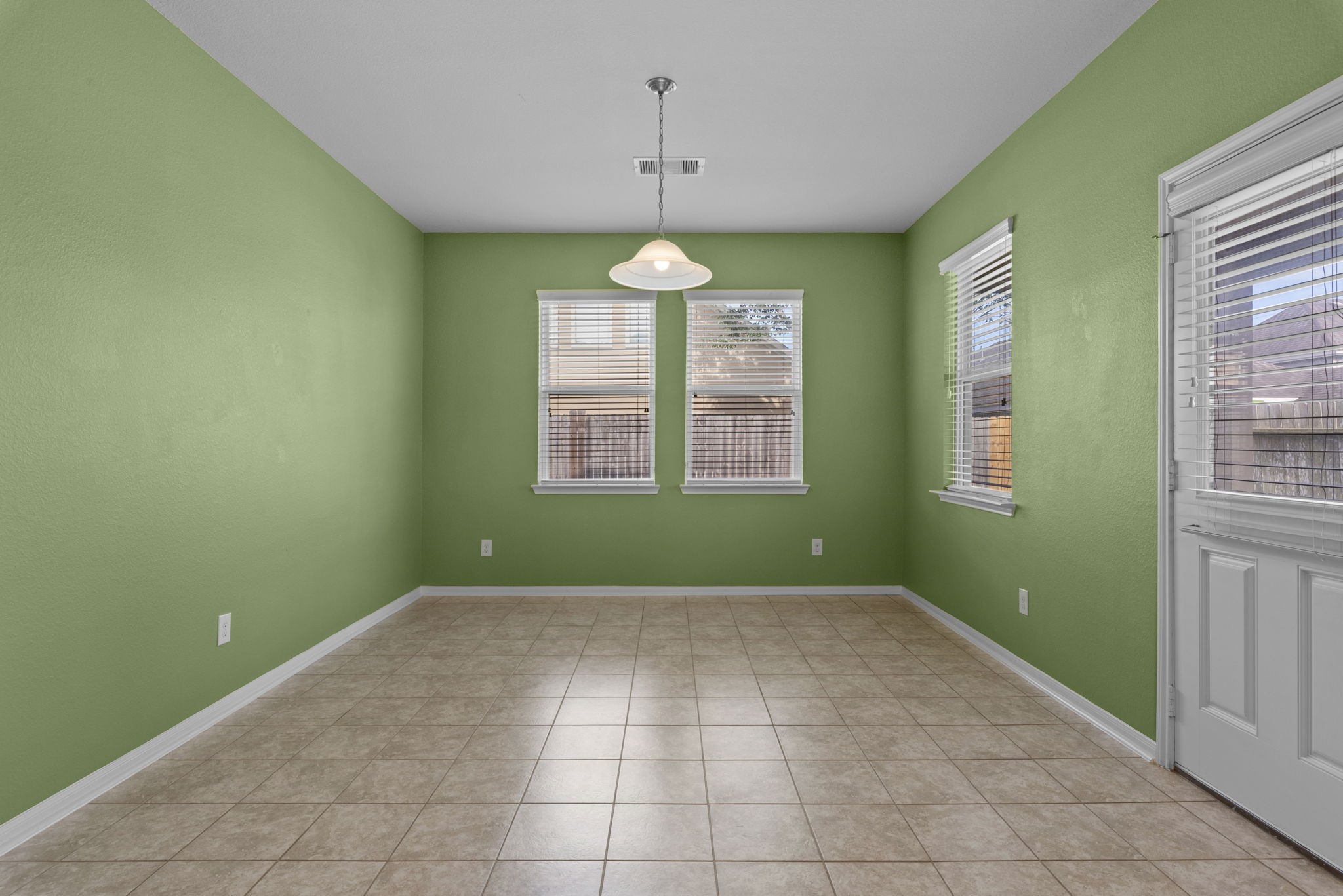 4706 Alluvial Circle Alvin, TX 77511 - Photo 19 of 39 a view of an empty room with a window