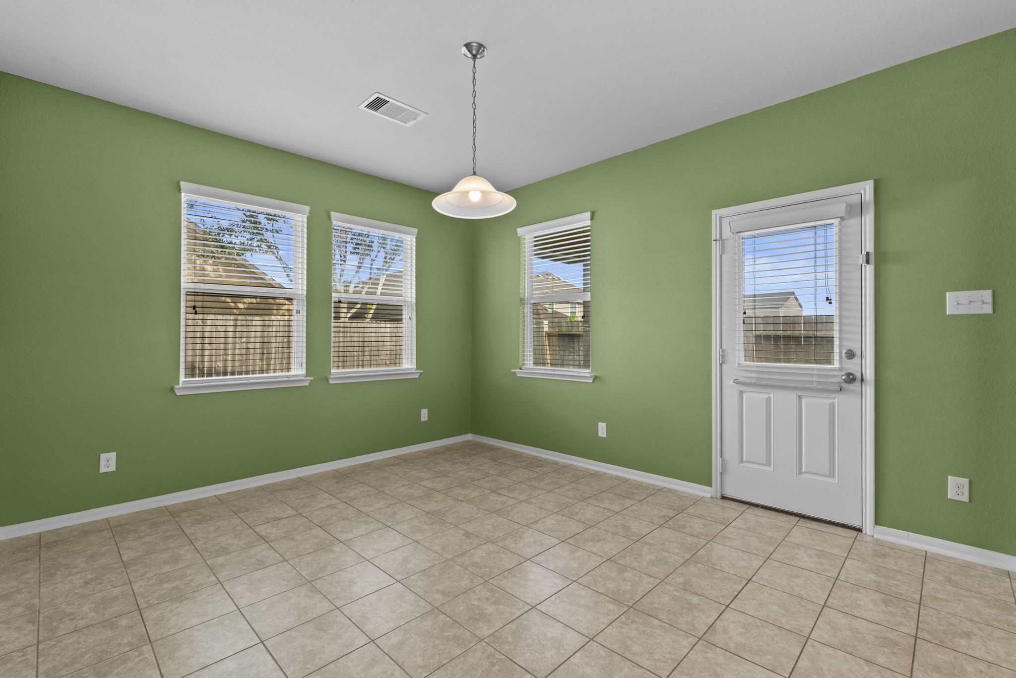 4706 Alluvial Circle Alvin, TX 77511 - Photo 20 of 39 a bedroom with window and ceiling fan