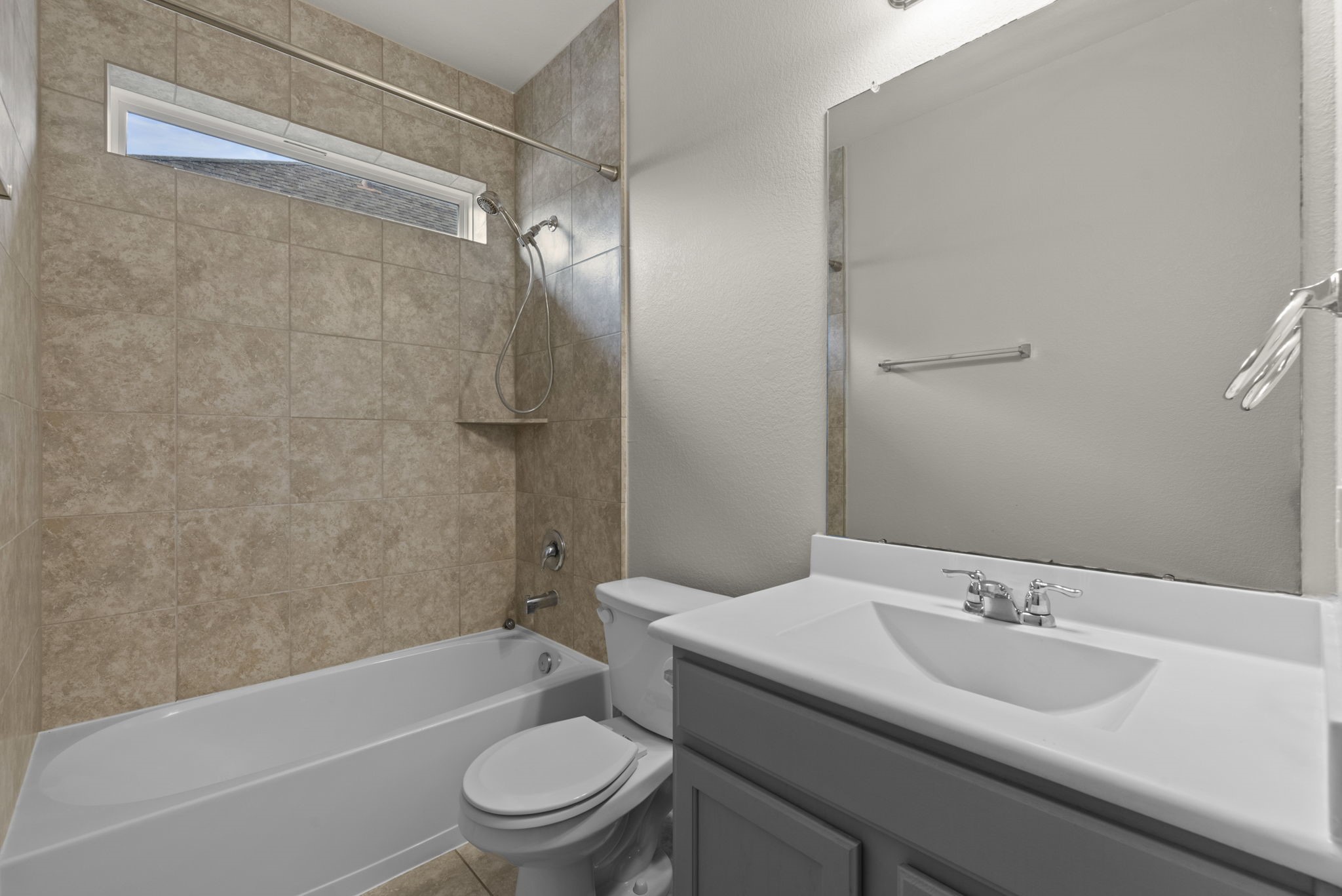 4706 Alluvial Circle Alvin, TX 77511 - Photo 30 of 39 a bathroom with a sink toilet and shower