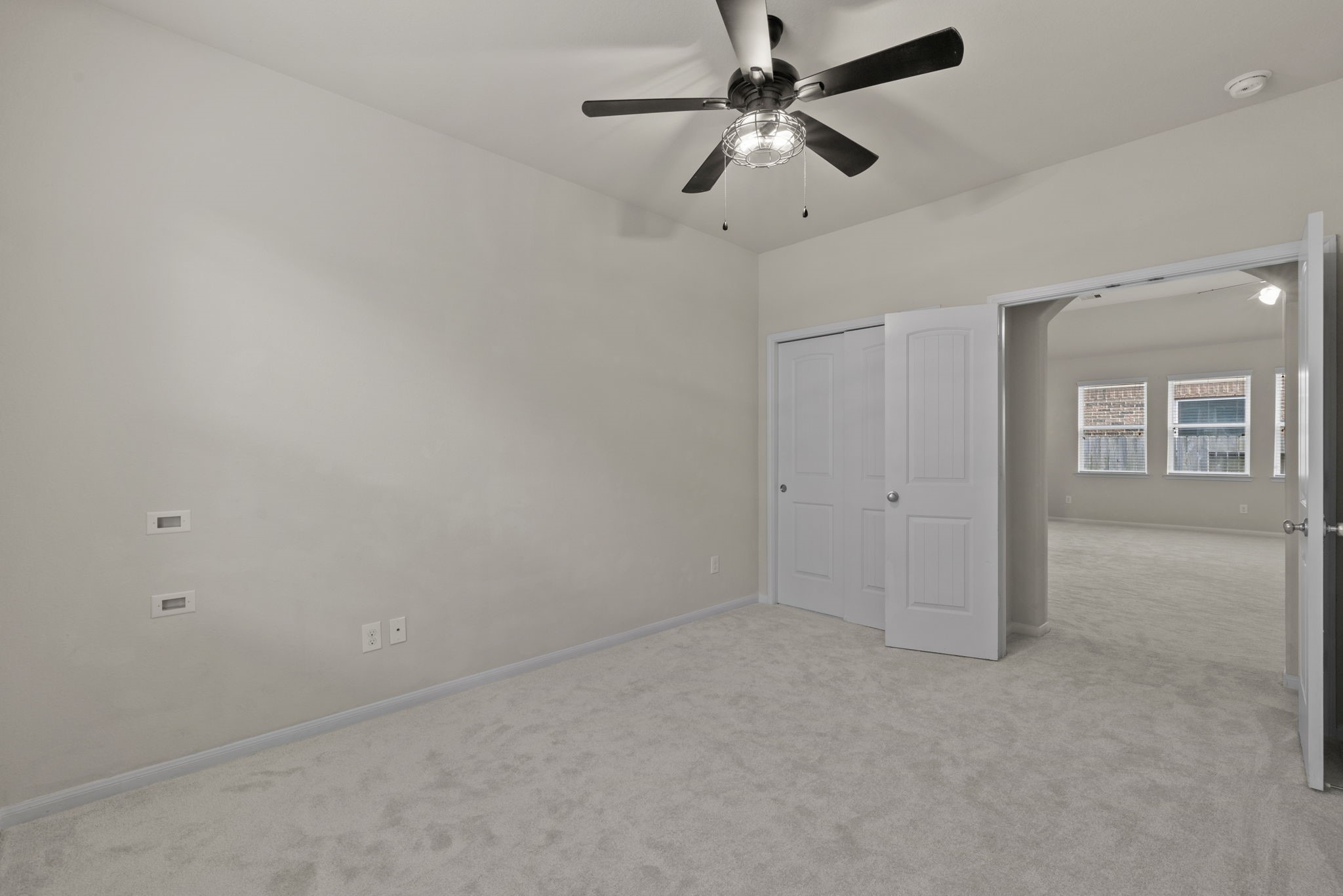 4706 Alluvial Circle Alvin, TX 77511 - Photo 34 of 39 en empty room with ceiling fan