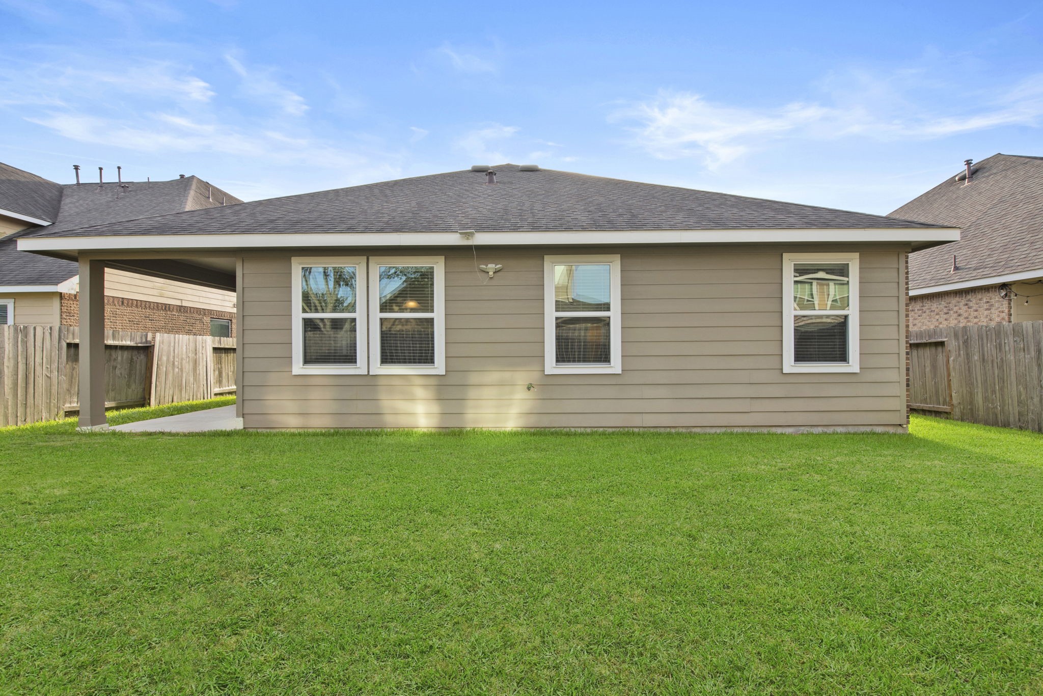 4706 Alluvial Circle Alvin, TX 77511 - Photo 38 of 39 a front view of a house with a yard