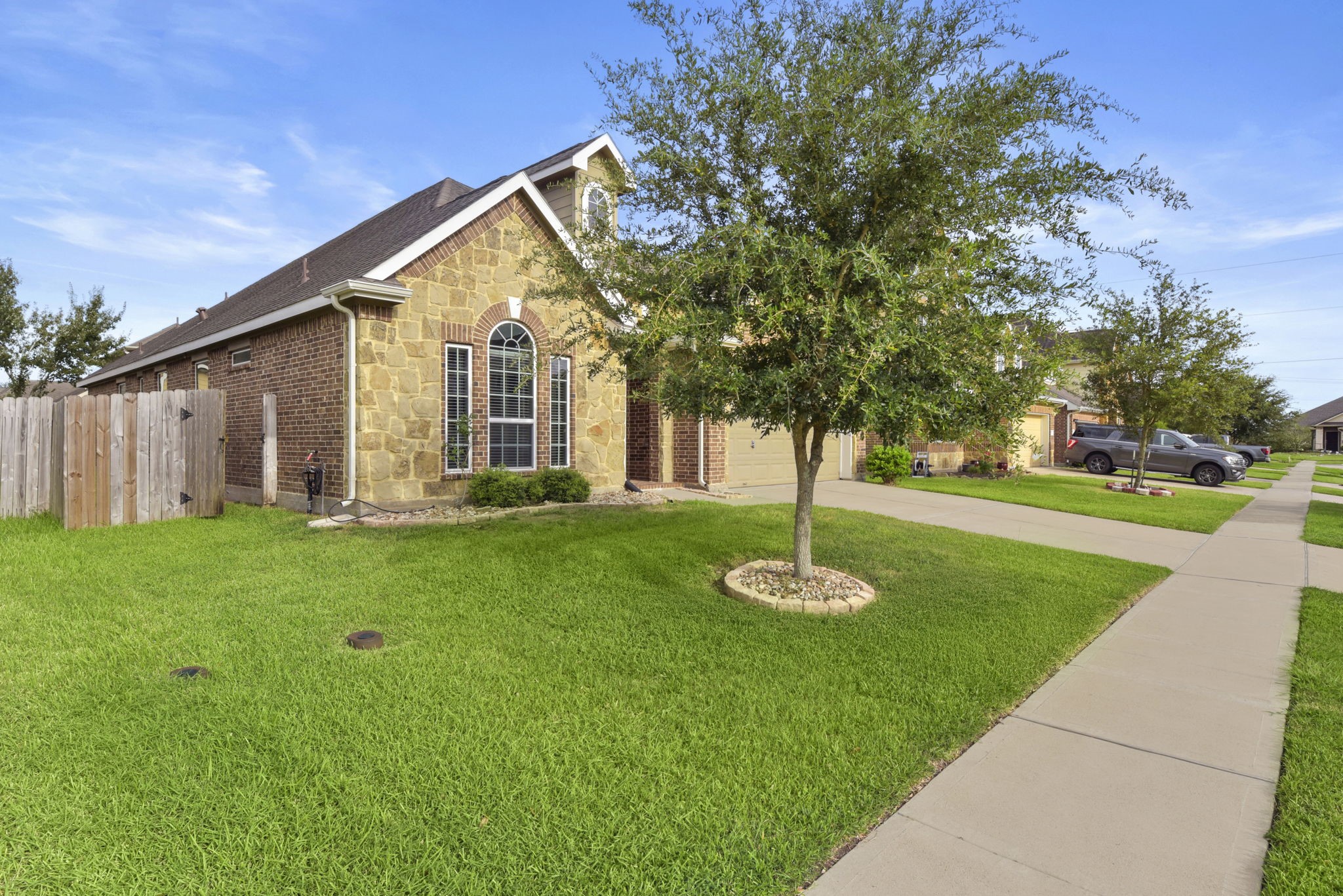 4706 Alluvial Circle Alvin, TX 77511 - Photo 39 of 39 a front view of house with yard and green space