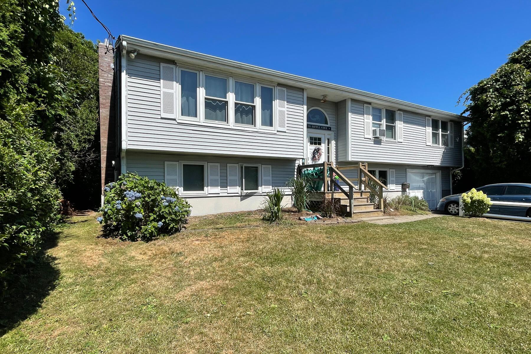 90 Ripple Cove Road Hyannis, MA 02601 - Photo 1 of 38 a view of a house with a patio