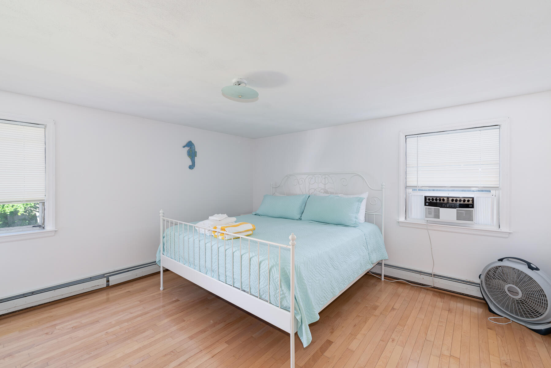 90 Ripple Cove Road Hyannis, MA 02601 - Photo 13 of 38 a bedroom with a bed and a window