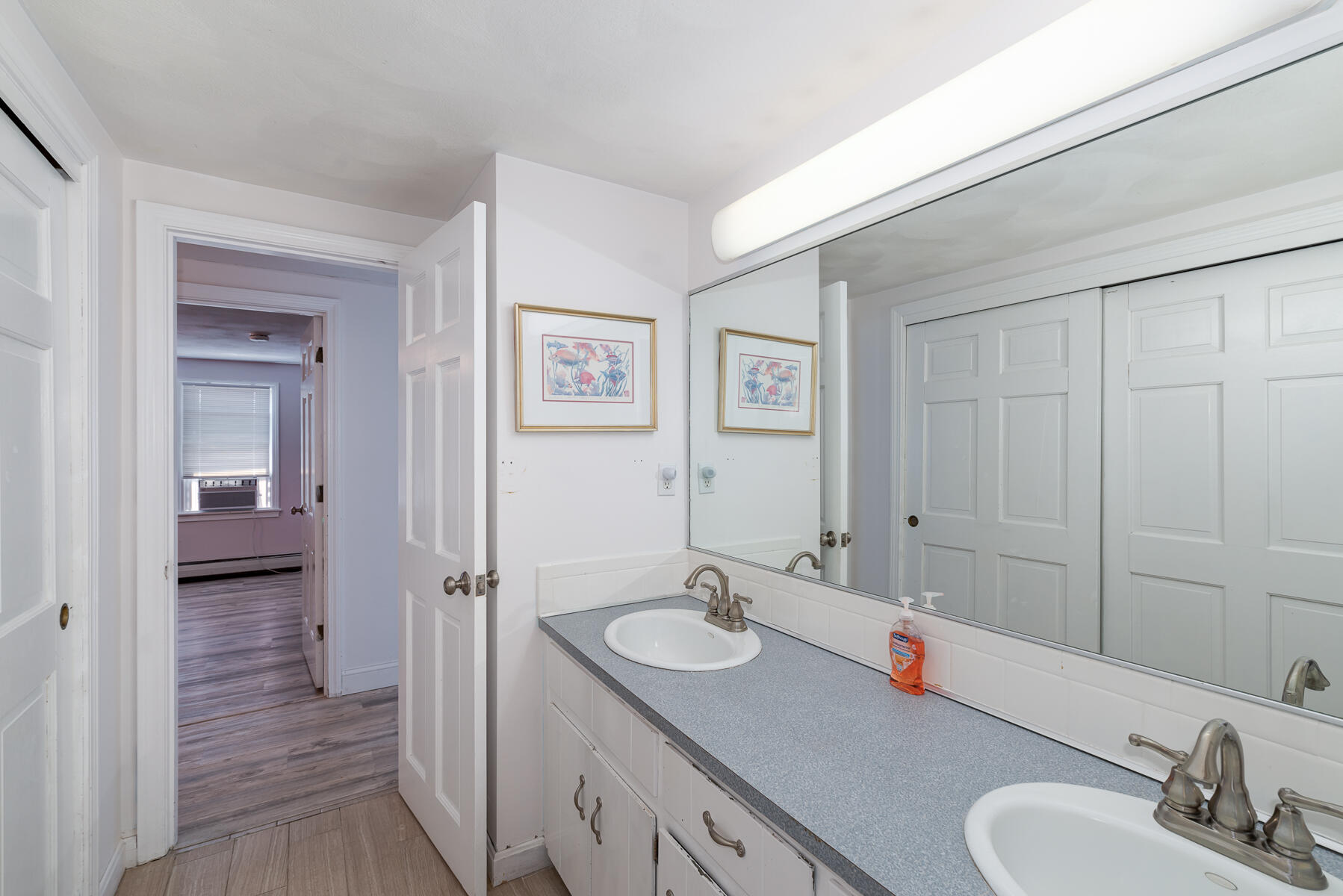 90 Ripple Cove Road Hyannis, MA 02601 - Photo 20 of 38 a bathroom with a granite countertop sink and a mirror