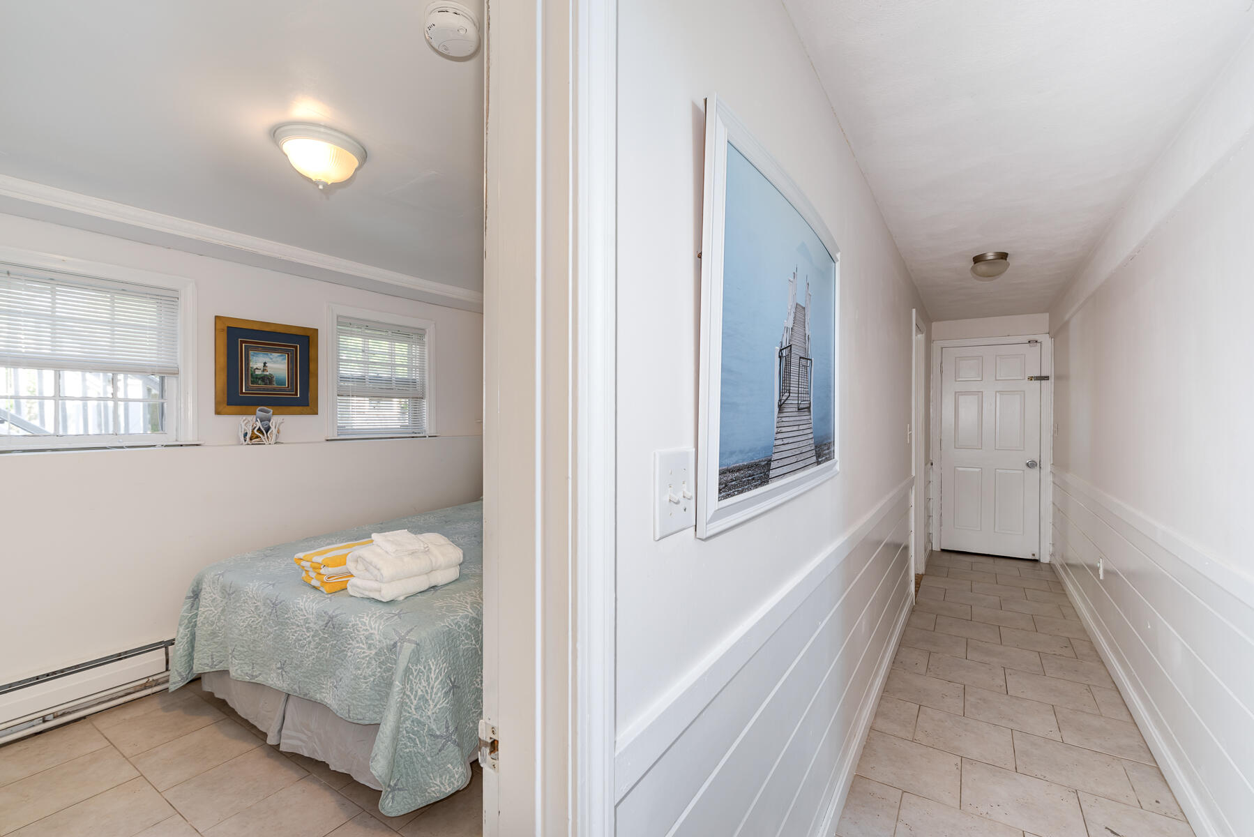 90 Ripple Cove Road Hyannis, MA 02601 - Photo 22 of 38 a view of a bedroom from a hallway