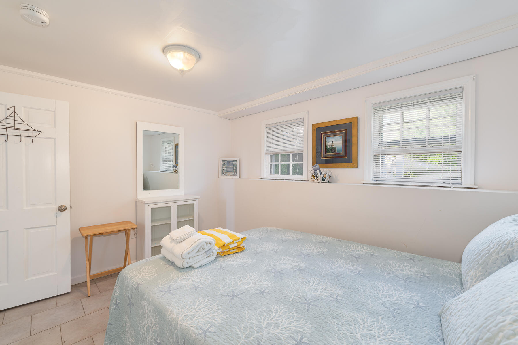 90 Ripple Cove Road Hyannis, MA 02601 - Photo 24 of 38 a bedroom with a bed and a window