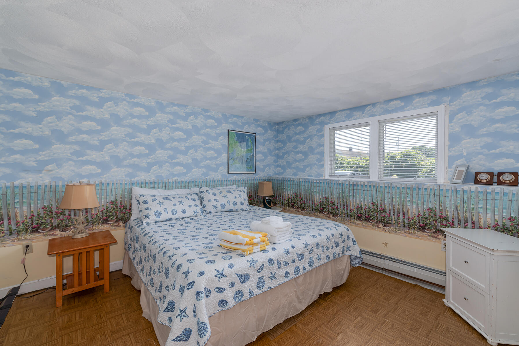 90 Ripple Cove Road Hyannis, MA 02601 - Photo 28 of 38 a bedroom with a bed and a dresser next to a window