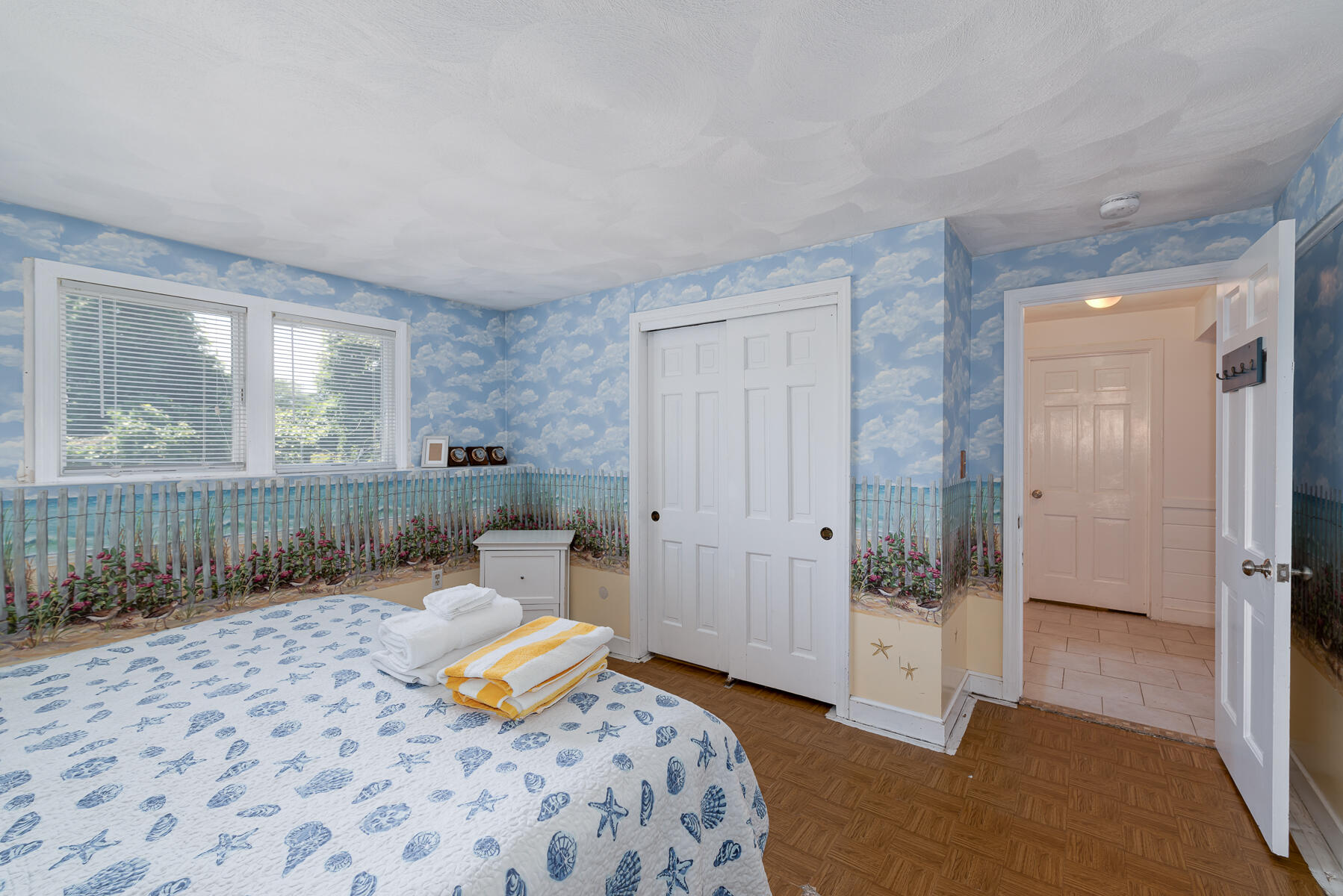 90 Ripple Cove Road Hyannis, MA 02601 - Photo 30 of 38 a bedroom with a bed and glass door