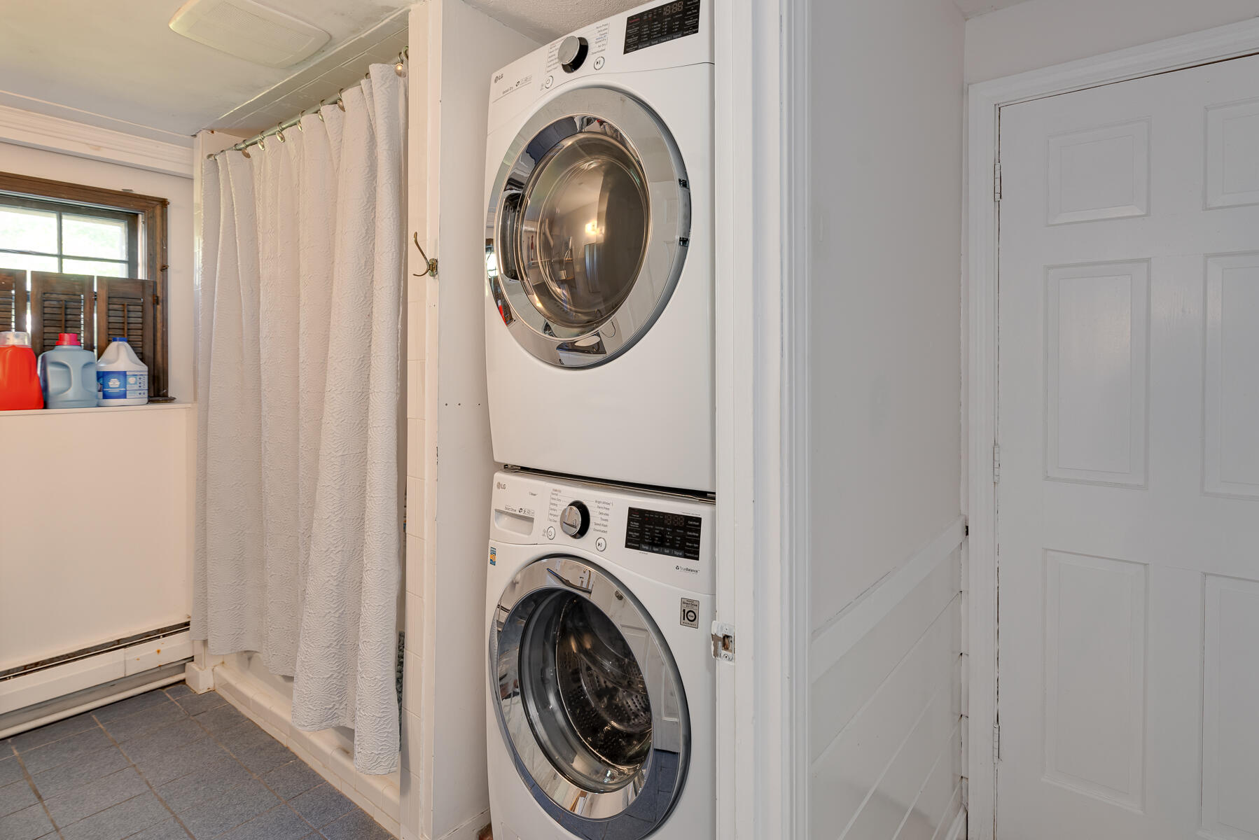 90 Ripple Cove Road Hyannis, MA 02601 - Photo 31 of 38 a view of a hallway with washer and dryer