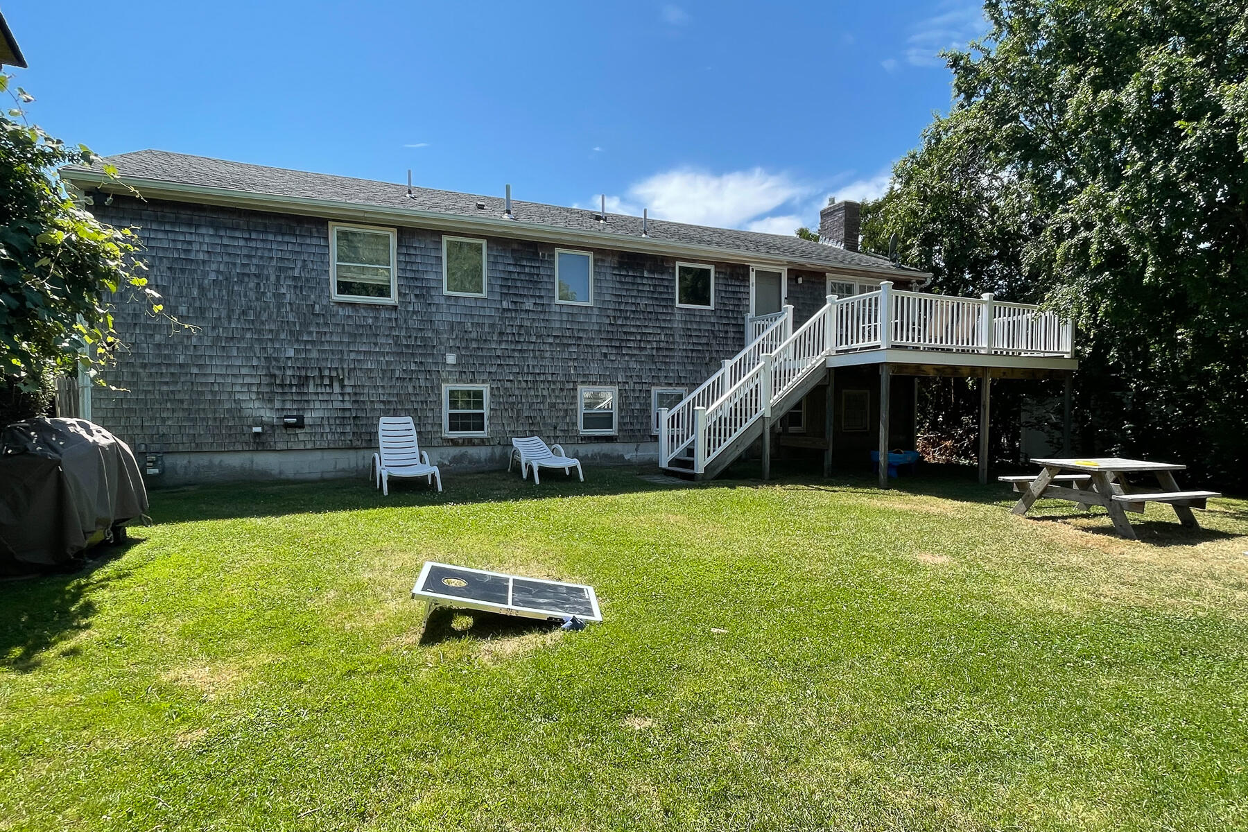 90 Ripple Cove Road Hyannis, MA 02601 - Photo 33 of 38 a view of a house with a yard