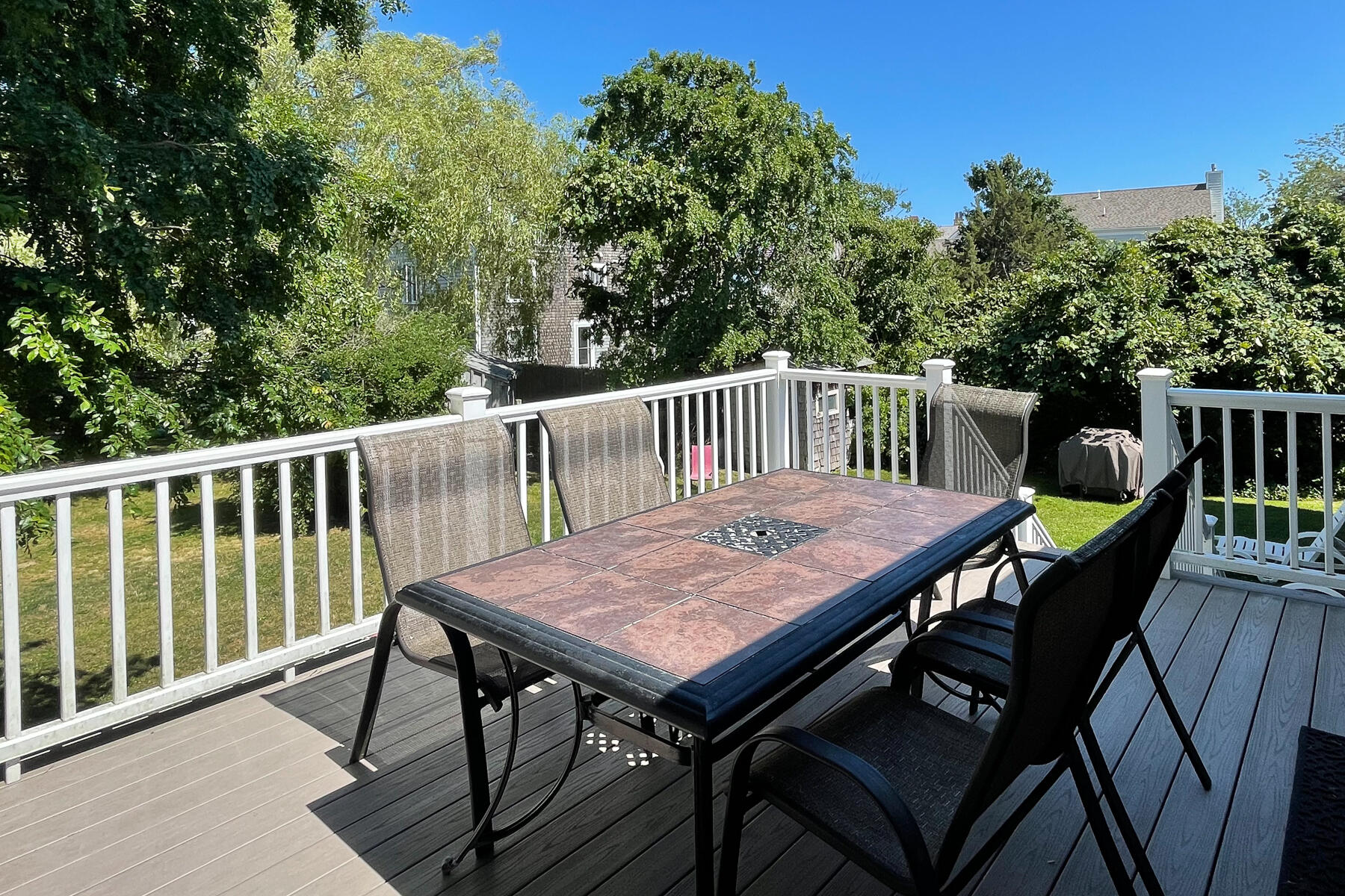 90 Ripple Cove Road Hyannis, MA 02601 - Photo 36 of 38 a view of a dinning table and chairs on the roof deck