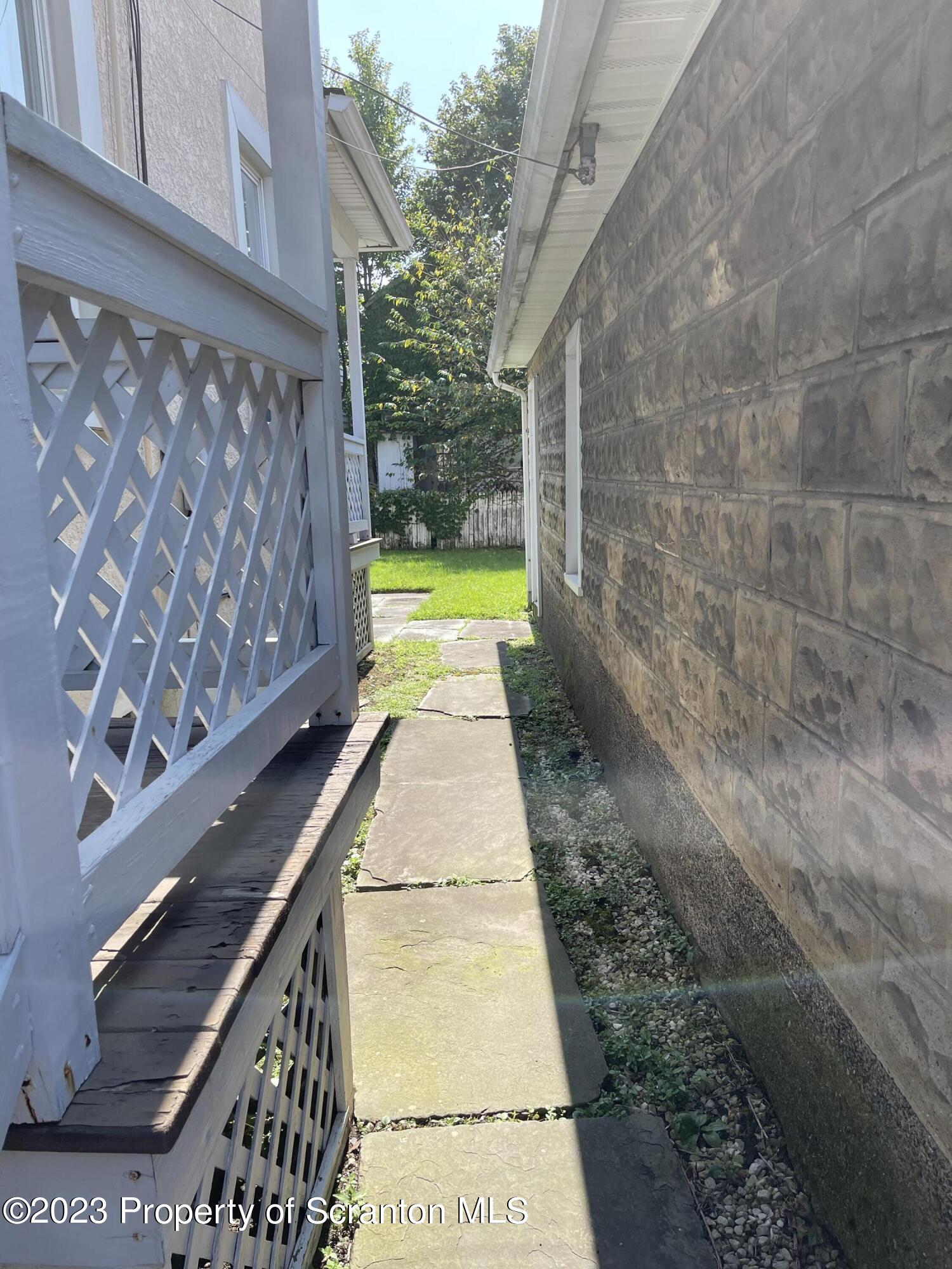 302 Rear Delaware Street Archbald, PA 18403 - Photo 19 of 20 a view of swimming pool with a yard