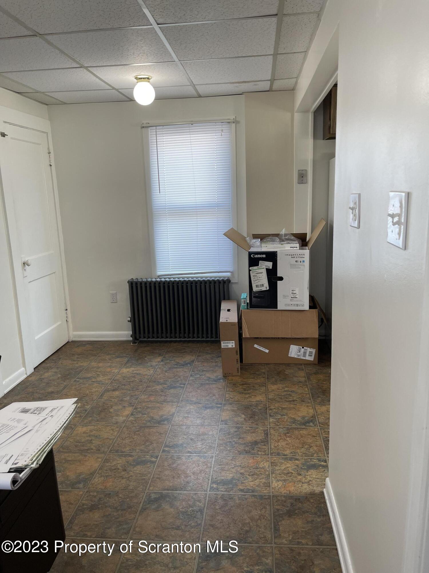 302 Rear Delaware Street Archbald, PA 18403 - Photo 7 of 20 a view of kitchen with furniture and window