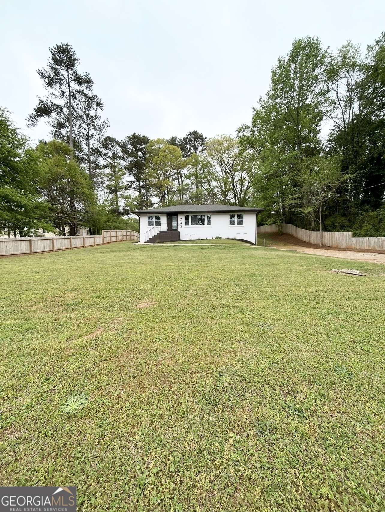 1742 Constitution Road Southeast Atlanta, GA 30316 - Photo 4 of 32 a view of a large yard with a large trees