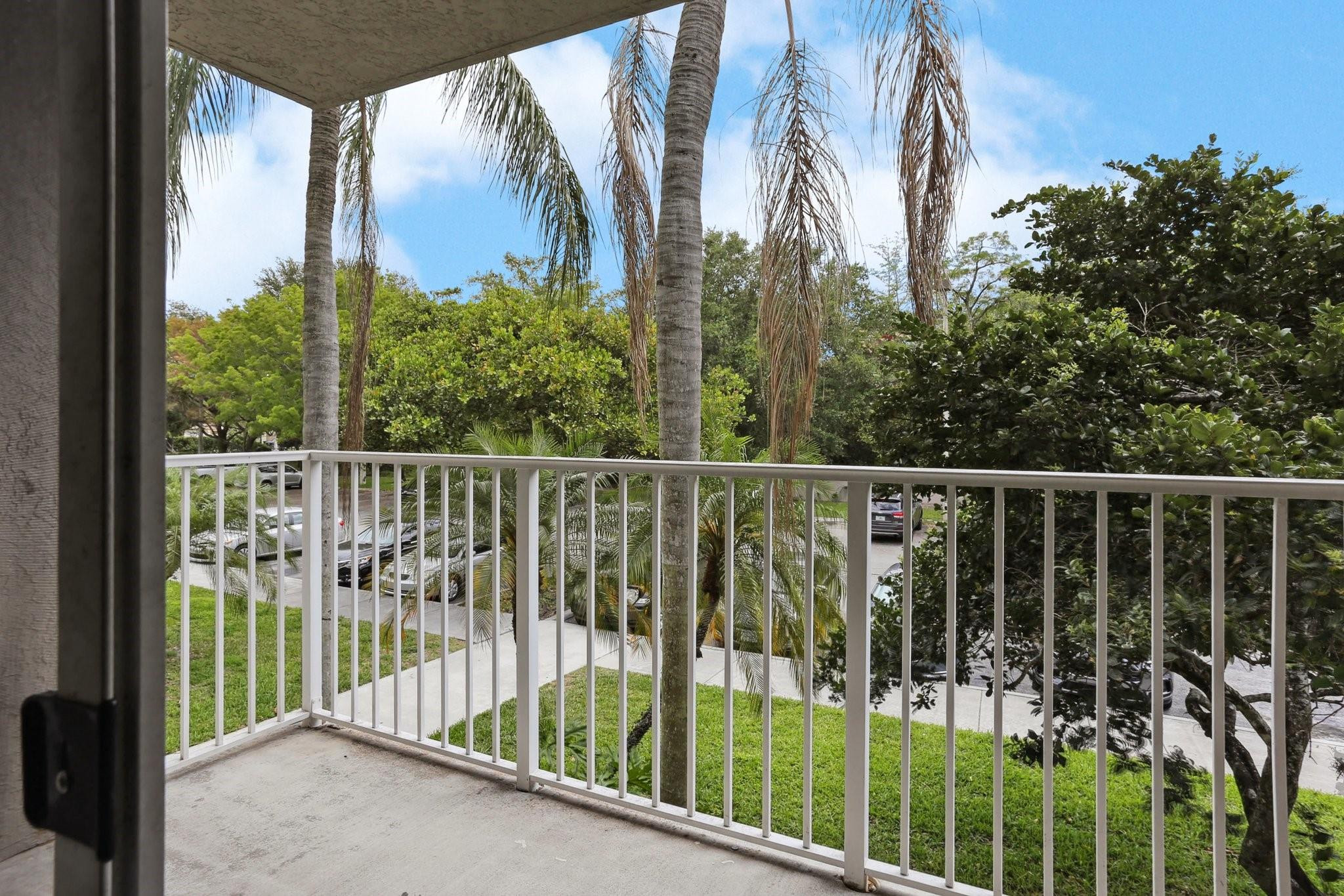 5051 Wiles Road, Unit 201 Coconut Creek, FL 33073 - Photo 30 of 41 a view of a balcony