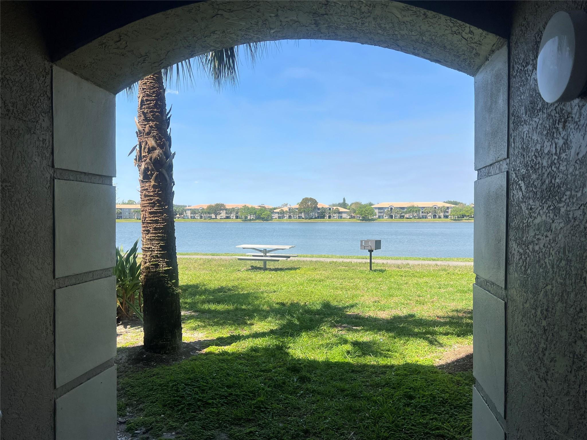 5051 Wiles Road, Unit 201 Coconut Creek, FL 33073 - Photo 36 of 41 a view of an ocean from a balcony