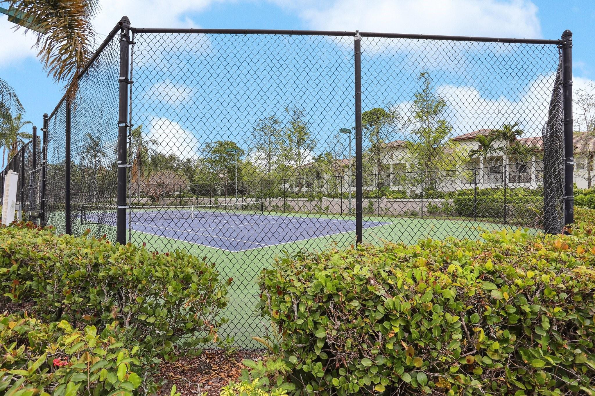5051 Wiles Road, Unit 201 Coconut Creek, FL 33073 - Photo 40 of 41 a view of a garden