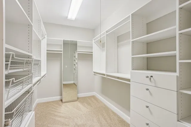 a view of an empty walk in closet
