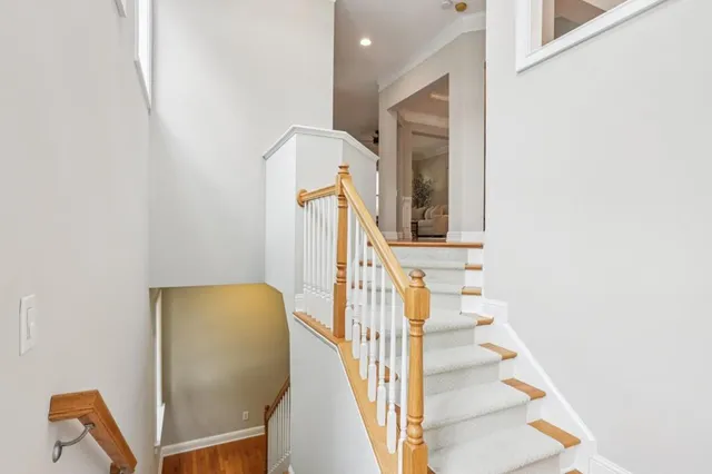 a view of a hallway with staircase