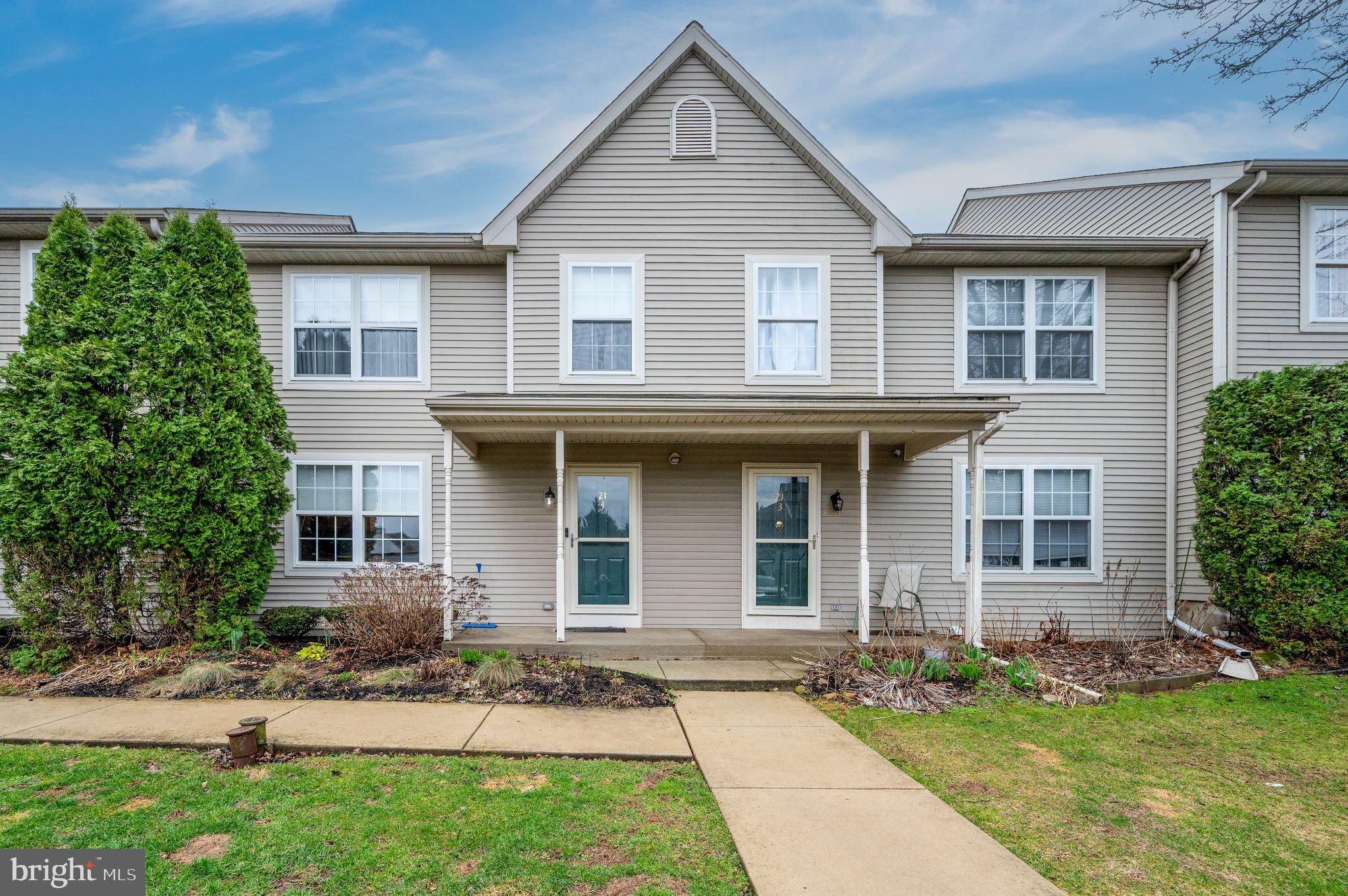 21-4 Cranberry Ridge, Unit 4 Reading, PA 19606 - Photo 1 of 41 a front view of a house with a garden and yard