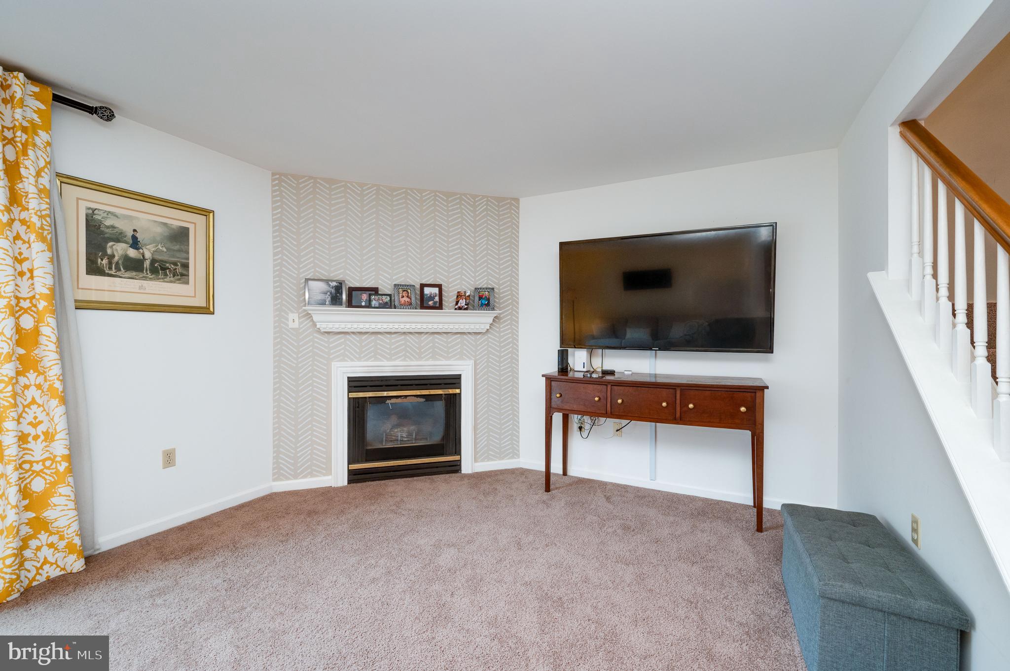 21-4 Cranberry Ridge, Unit 4 Reading, PA 19606 - Photo 19 of 41 a living room with furniture and a flat screen tv