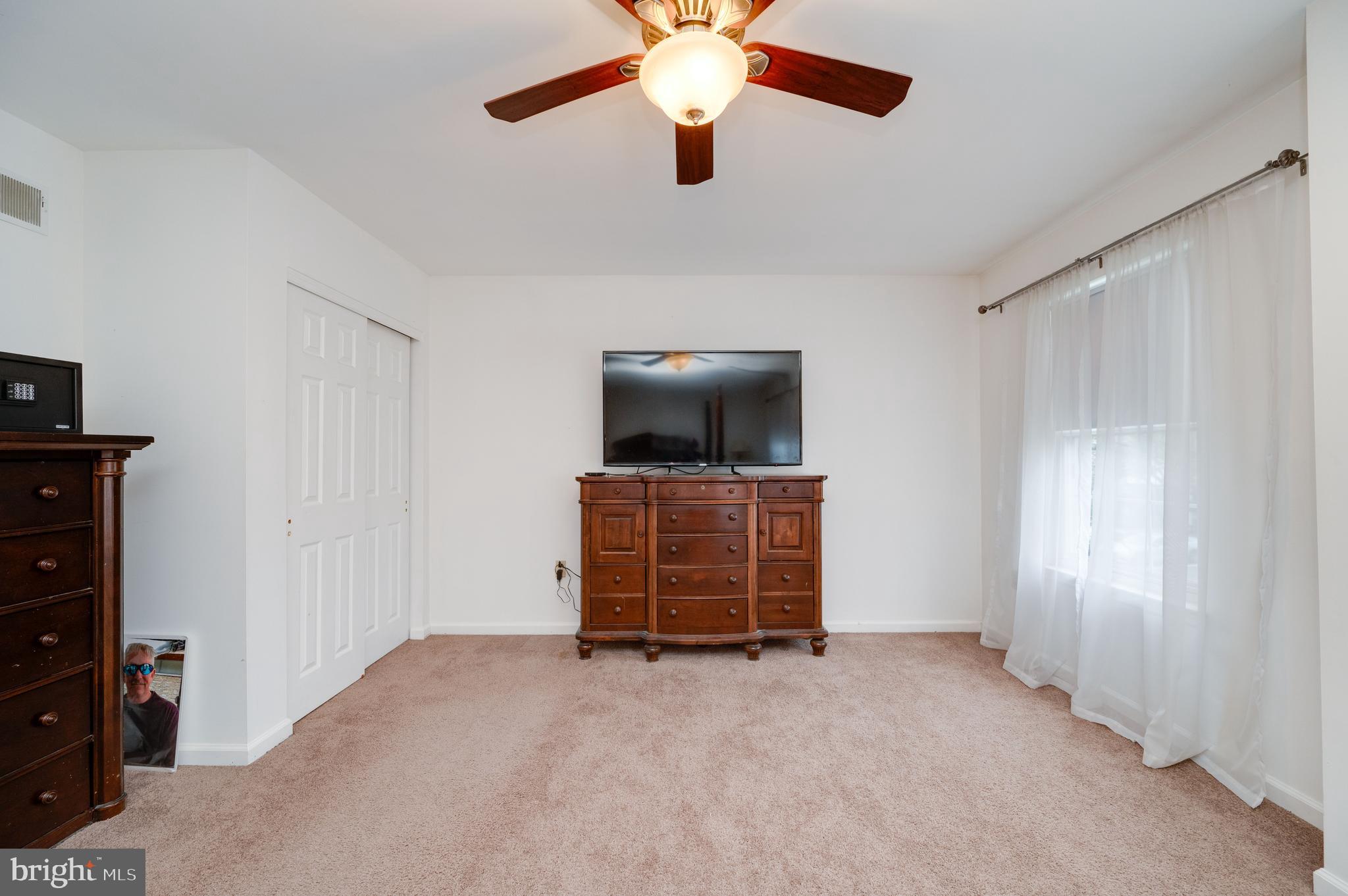 21-4 Cranberry Ridge, Unit 4 Reading, PA 19606 - Photo 25 of 41 a view of room with window and a ceiling fan