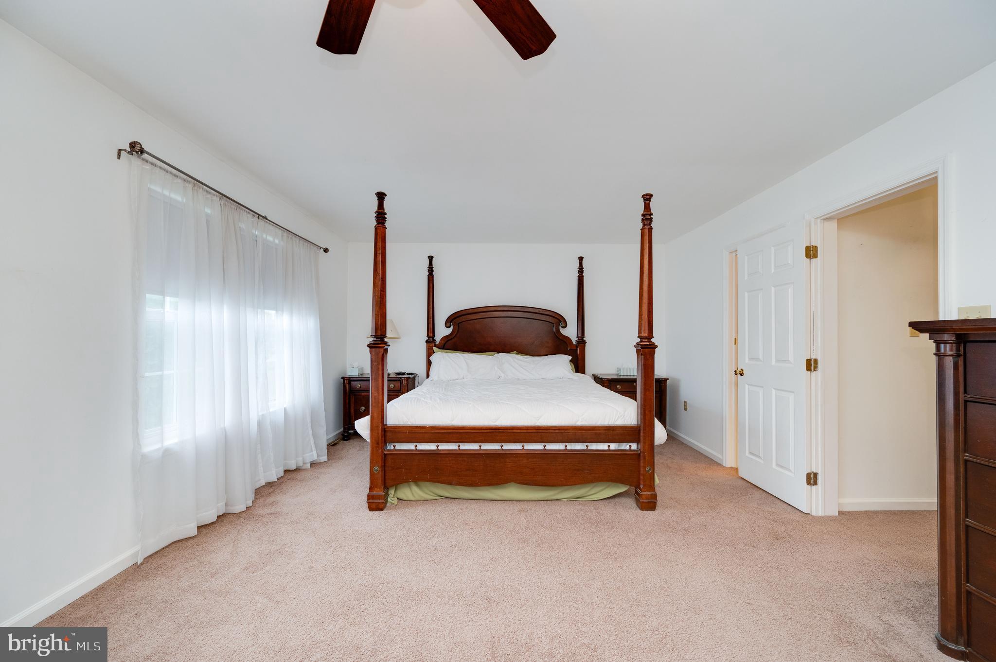 21-4 Cranberry Ridge, Unit 4 Reading, PA 19606 - Photo 26 of 41 a bedroom with a bed and cabinets
