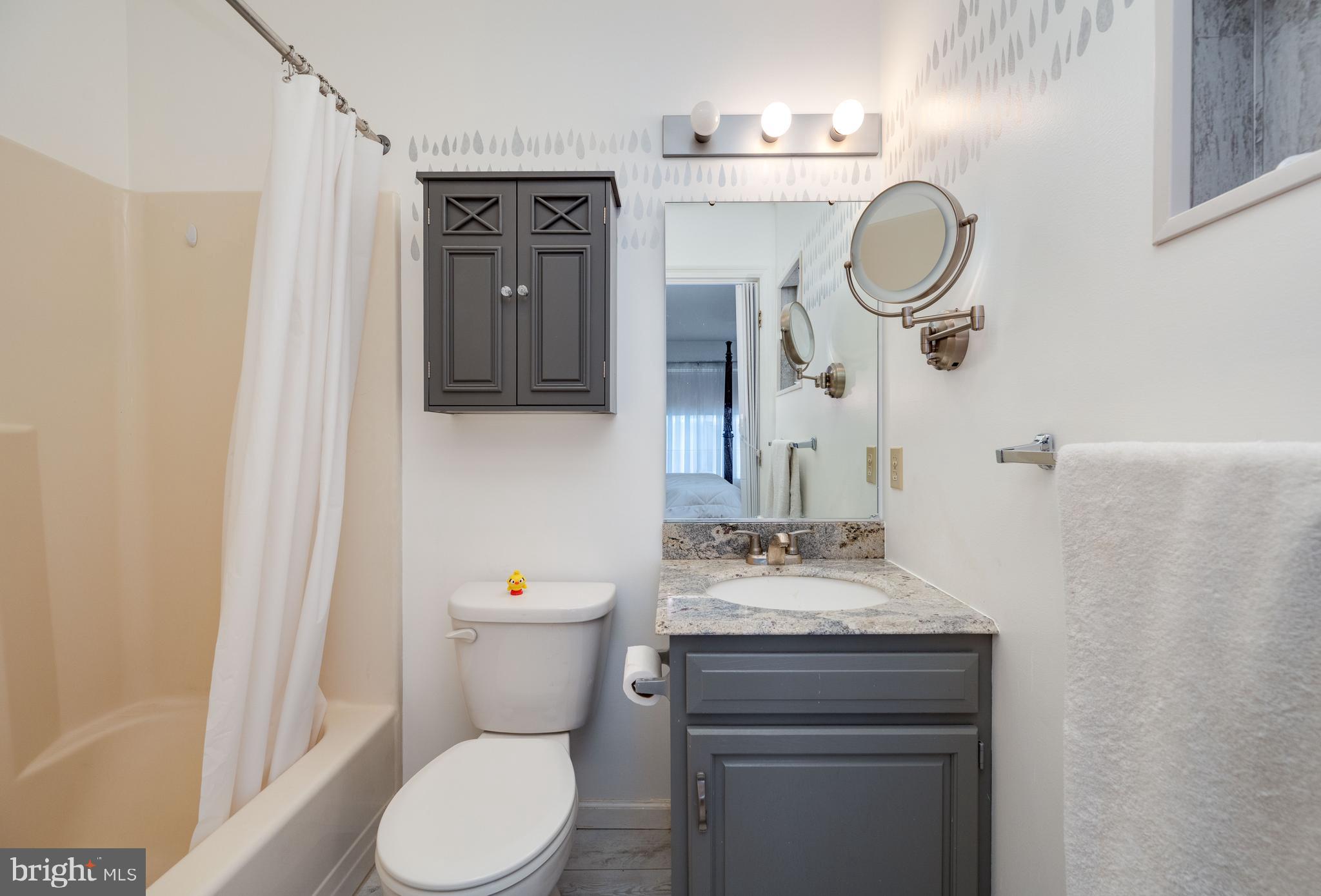 21-4 Cranberry Ridge, Unit 4 Reading, PA 19606 - Photo 27 of 41 a bathroom with a toilet sink and mirror