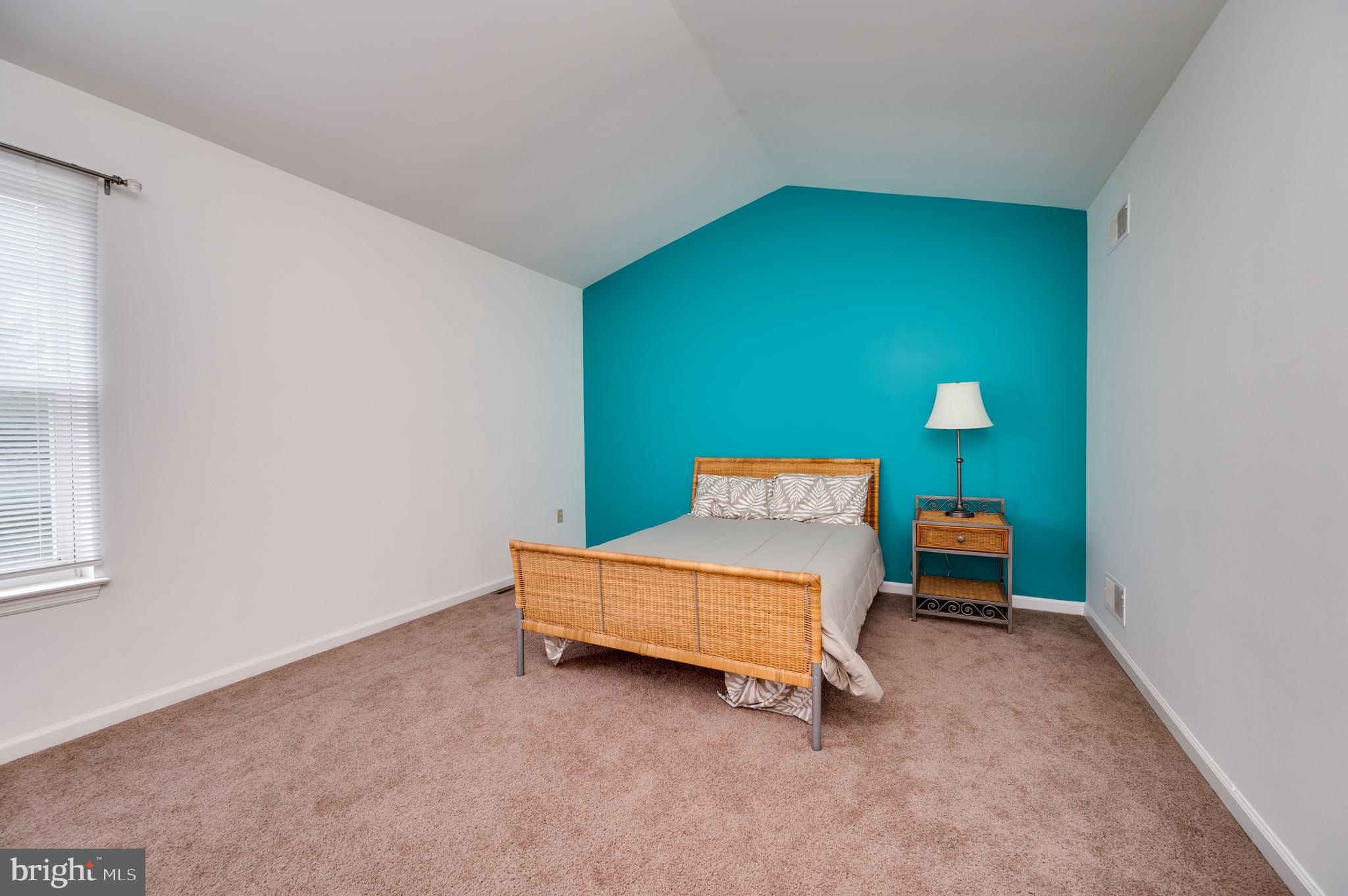 21-4 Cranberry Ridge, Unit 4 Reading, PA 19606 - Photo 29 of 41 a living room with a bed and a table
